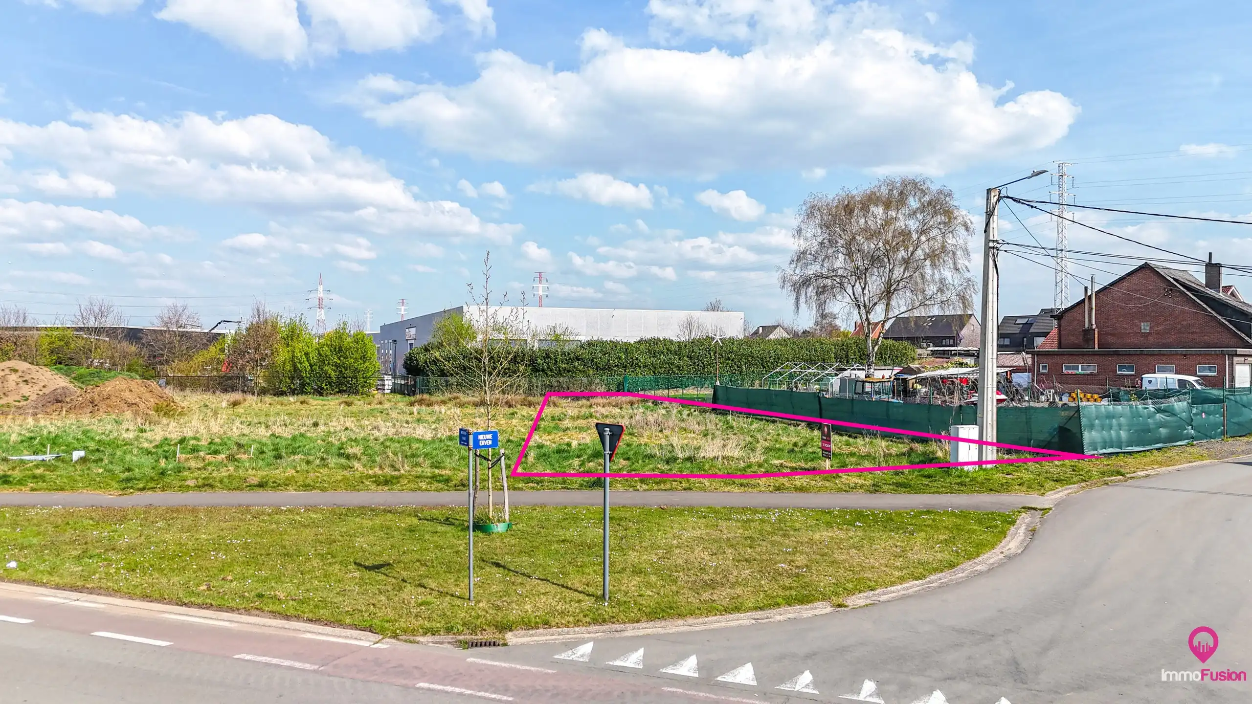 Centraal gelegen bouwgrond voor open bebouwing in Paal! foto 9