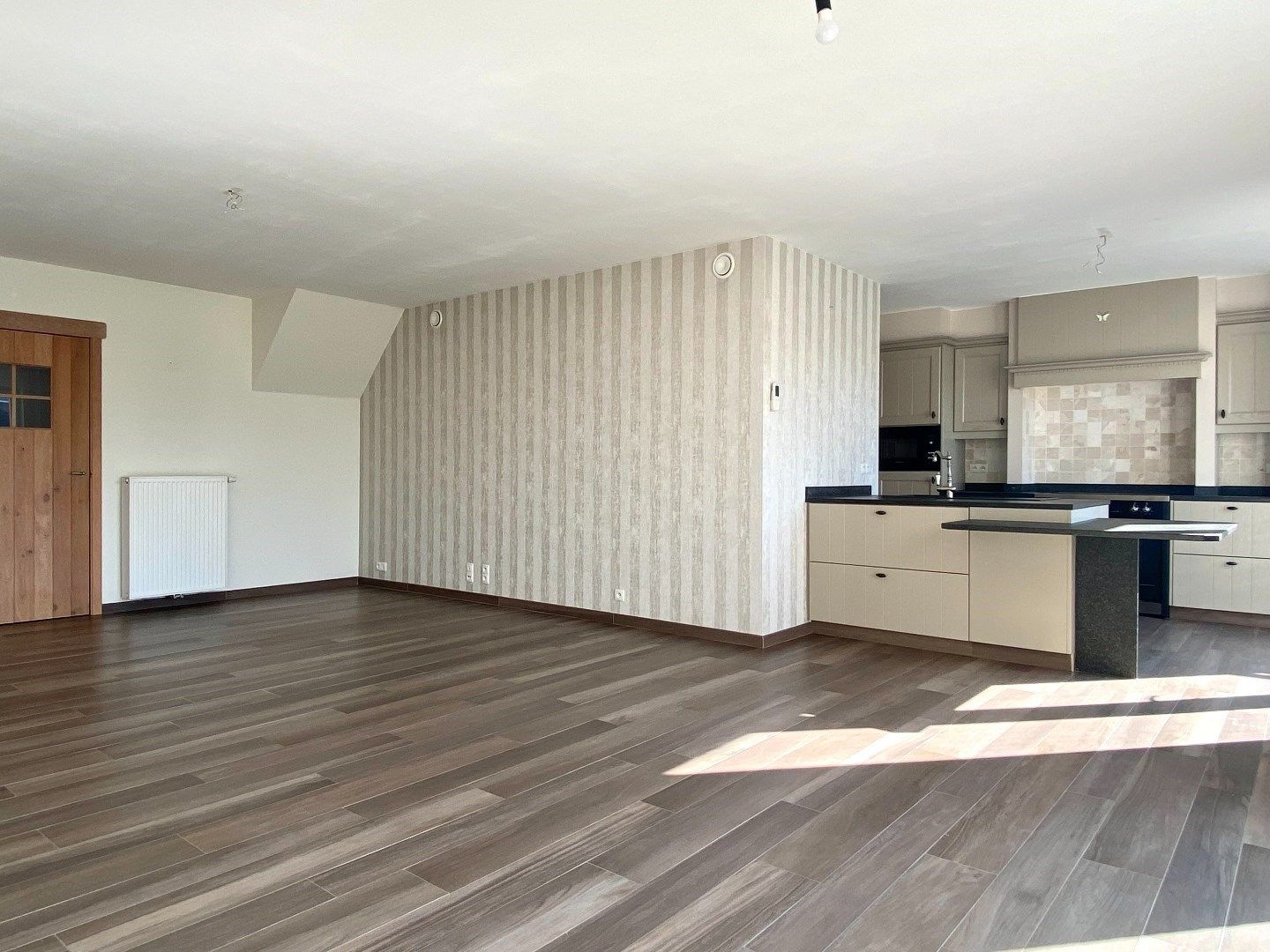 Kindvriendelijke en lichtrijke woning te huur in Wevelgem foto 5