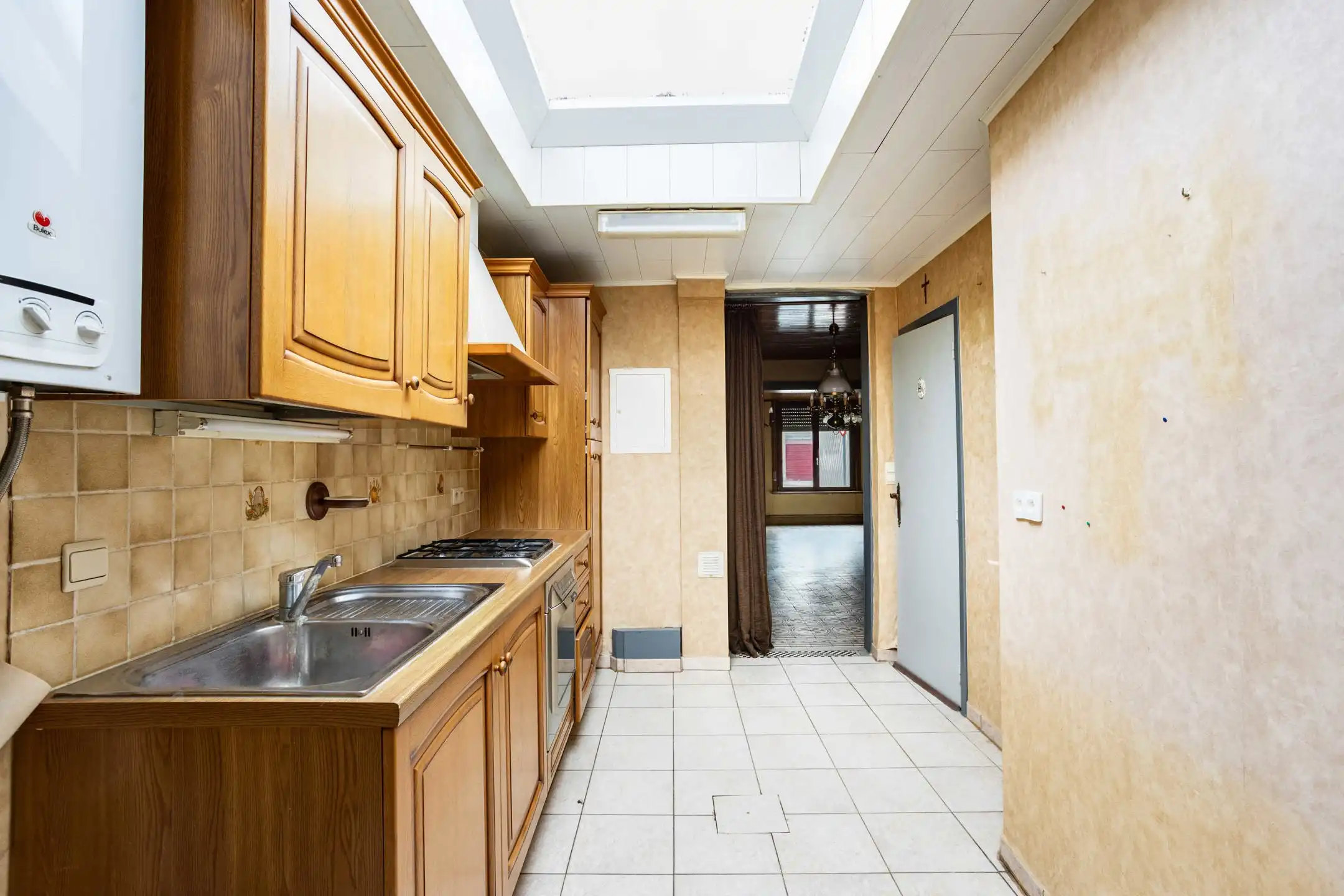 Te renoveren woning met aangename stadstuin foto 11