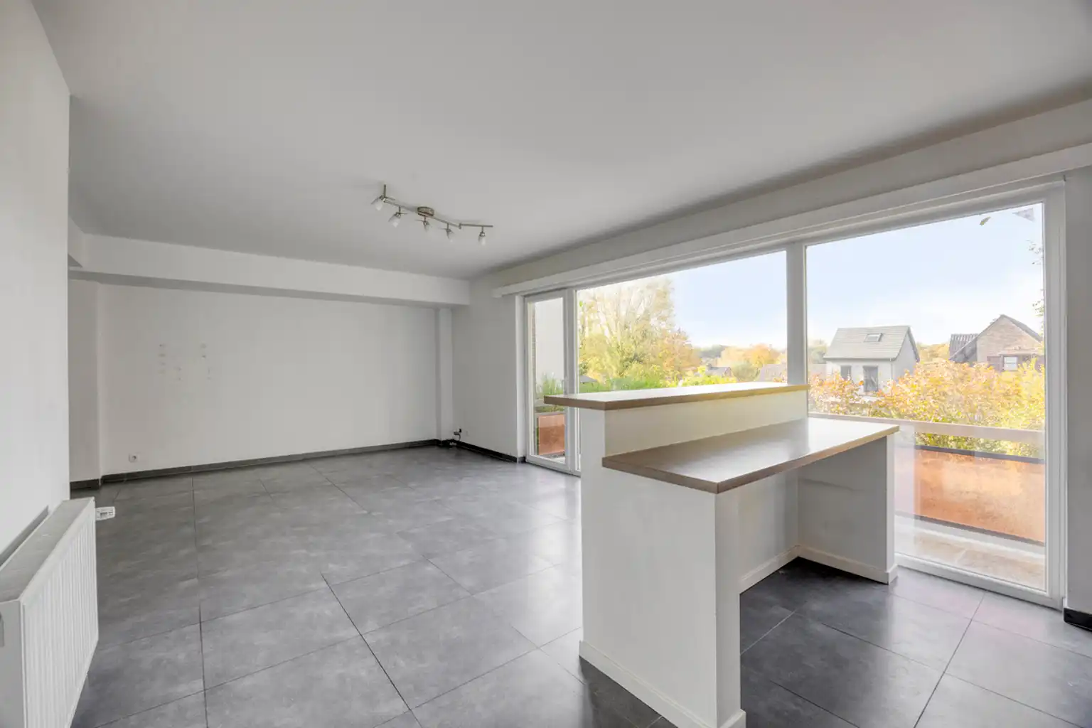 Instapklaar gelijkvloers appartement met eigen tuin foto 8