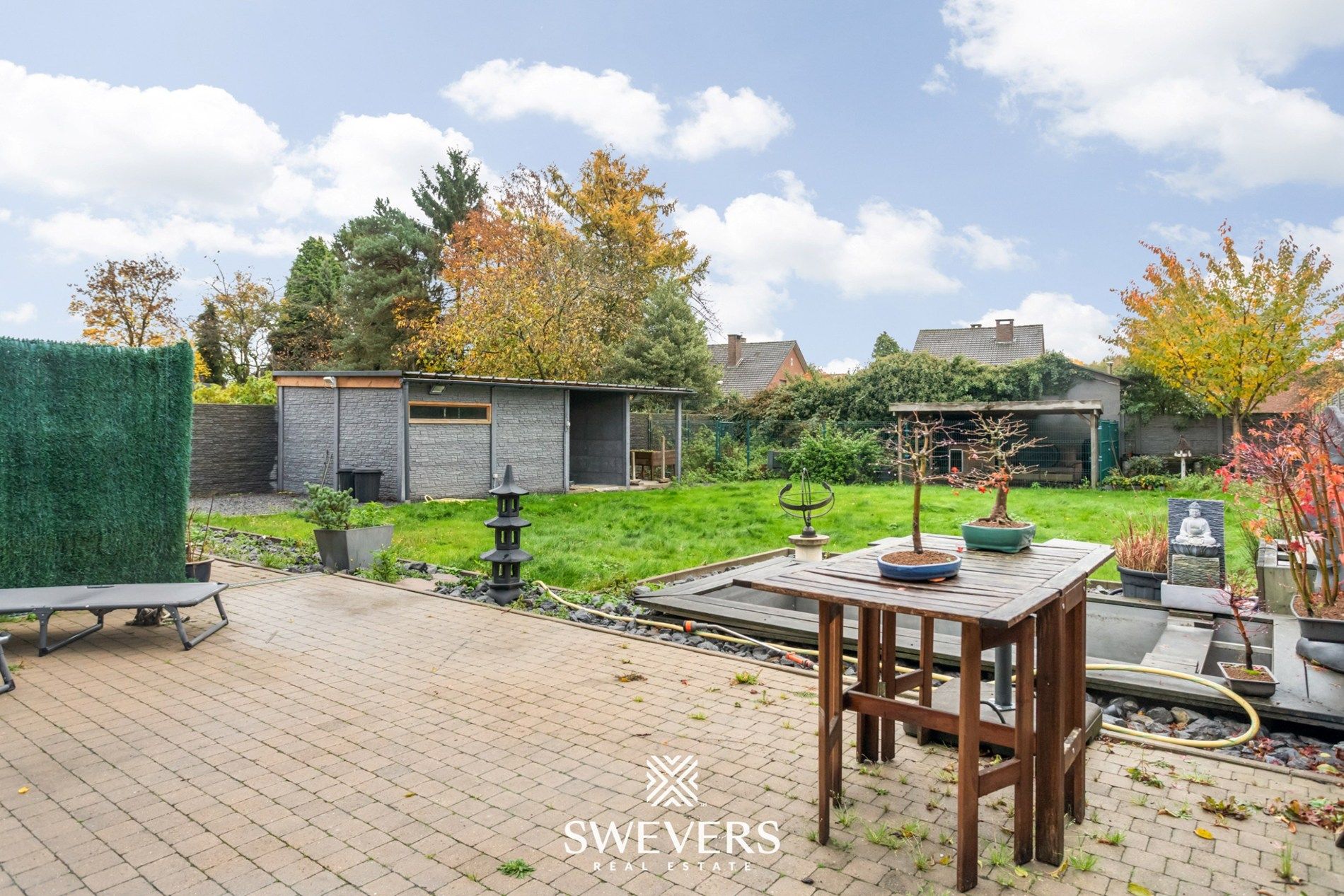 Ruime, instapklare woning met drie slaapkamers en prachtige tuin foto 24