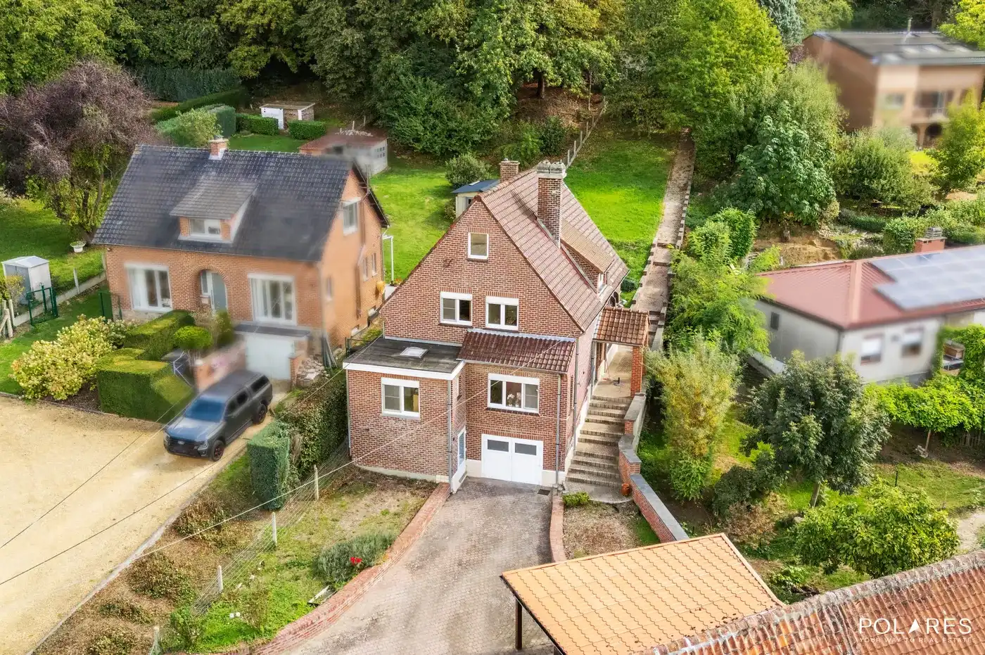 Karaktervolle gezinswoning met fijne tuin en bosje. foto 2
