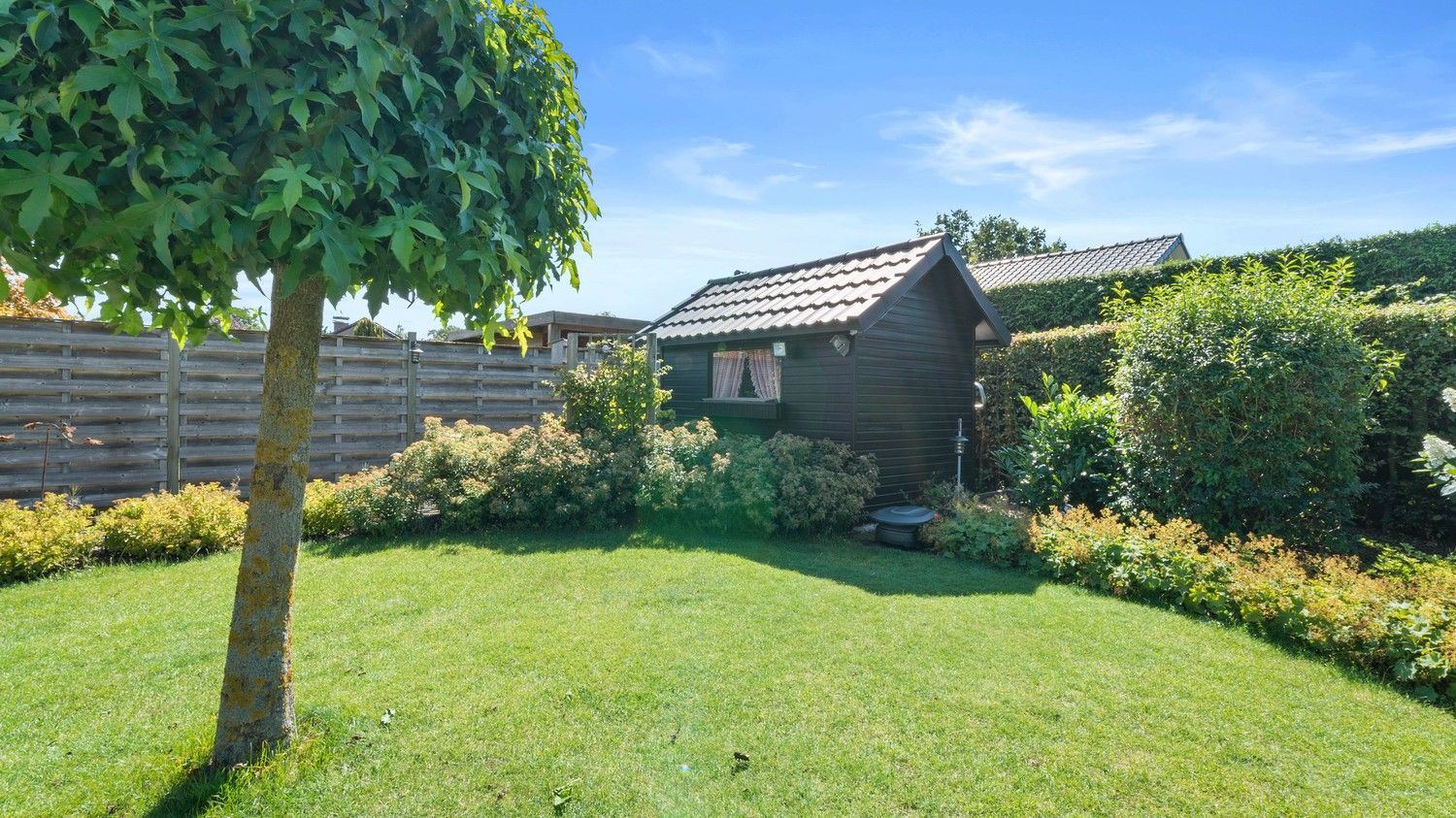 Zeer nette, gelijkvloerse woning met 3 slaapkamers, tuin en garage foto 28