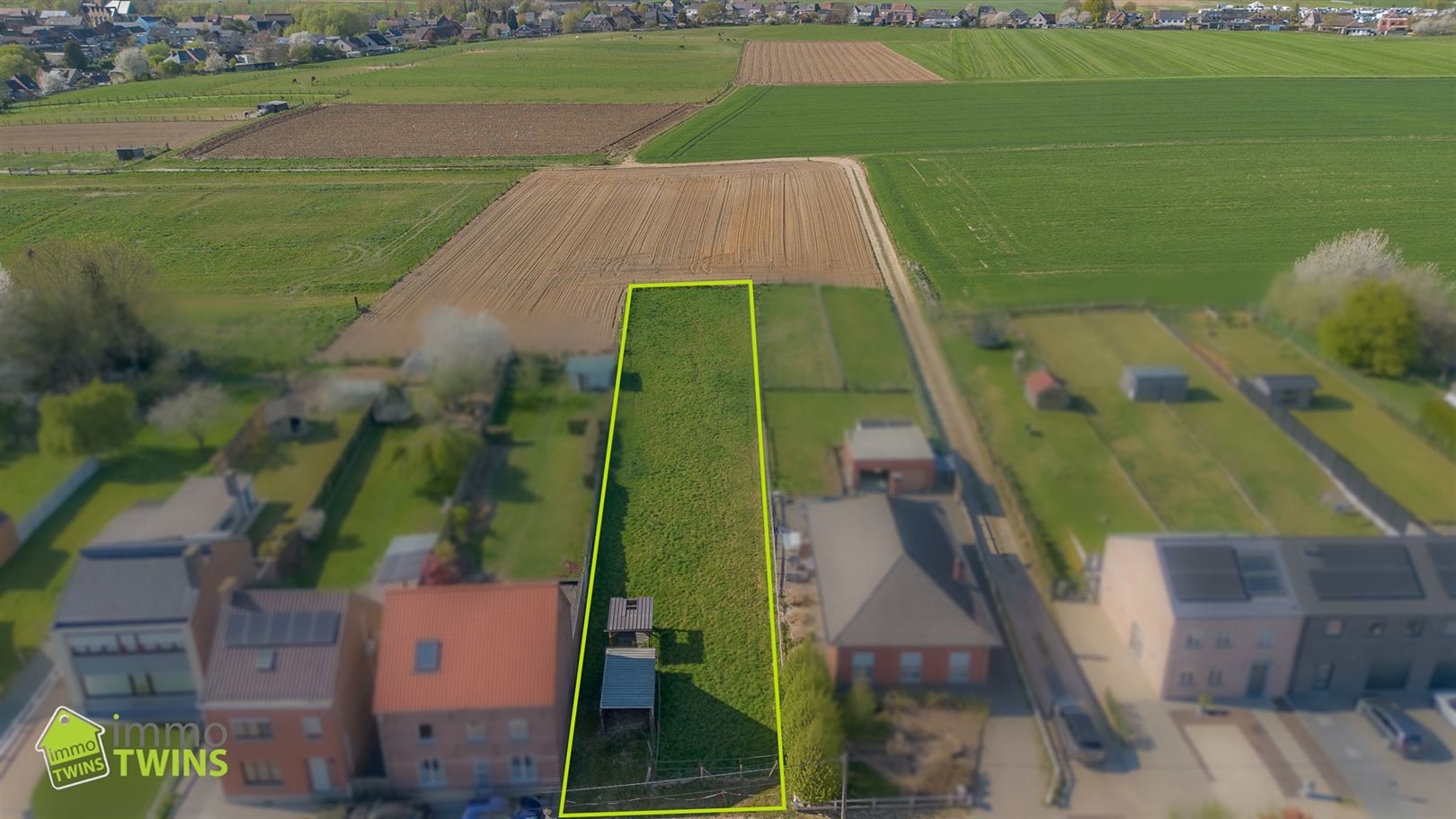 Bouwgrond halfopen bebouwing met weids groenzicht te Ninove foto 4