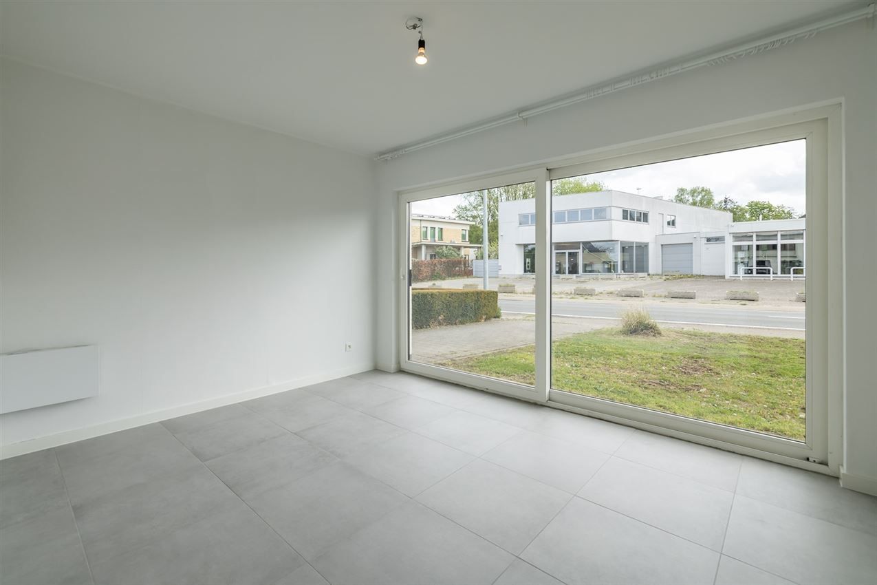Gelijkvloers appartement, twee slpk., autostaanplaats foto 12