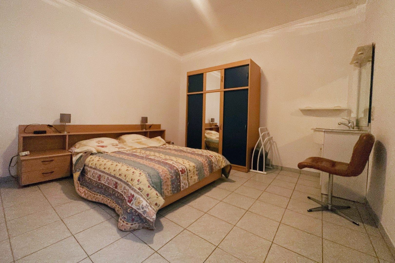 Prachtige interbellumwoning onderverdeeld in drie ruime appartementen foto 7
