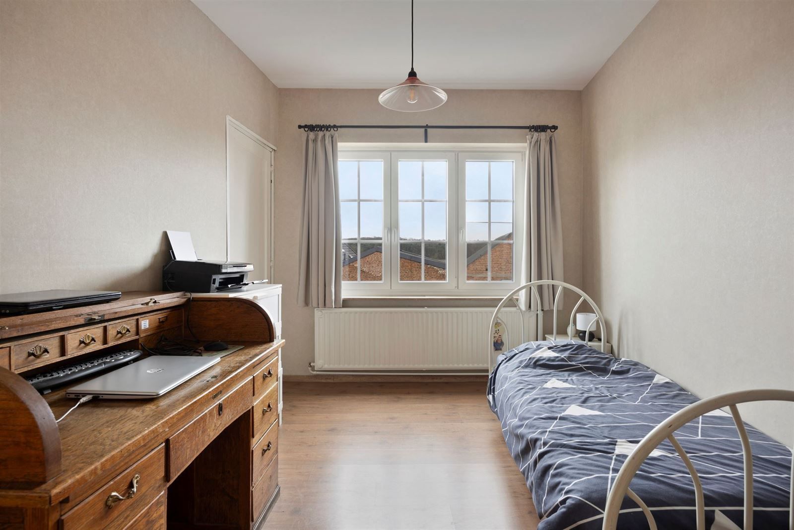 Woning met aparte praktijkruimte foto 19