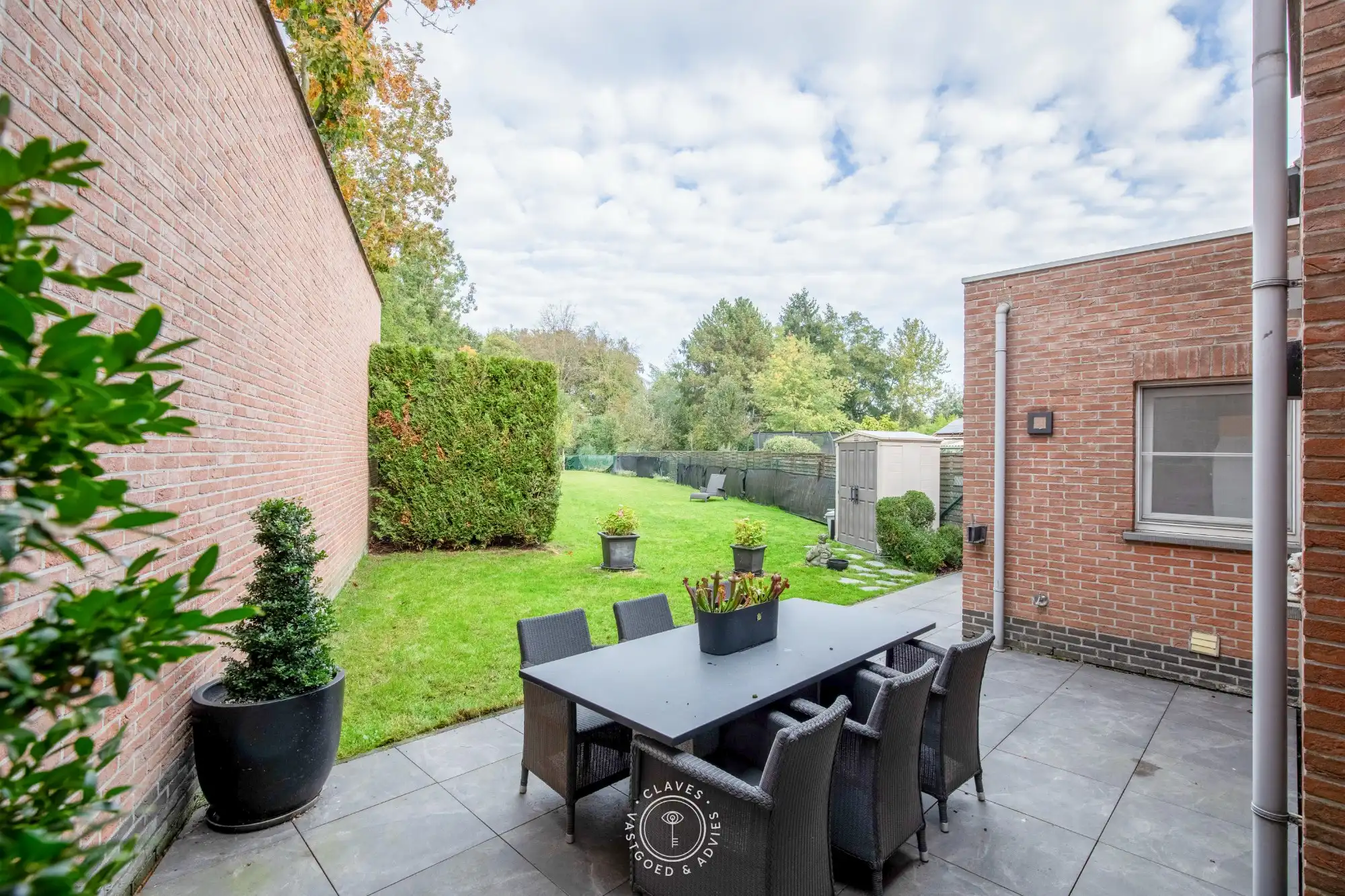 Instapklare gezinswoning met 3 slaapkamers, garage en verrassend ruime tuin in Sint-Niklaas foto 21