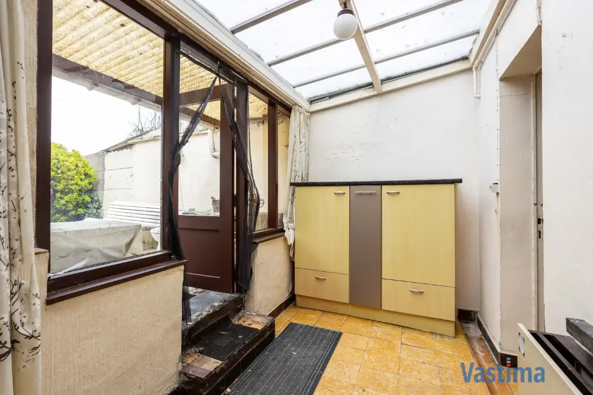 Te renoveren woning met tuin nabij OLV-Ziekenhuis foto 11