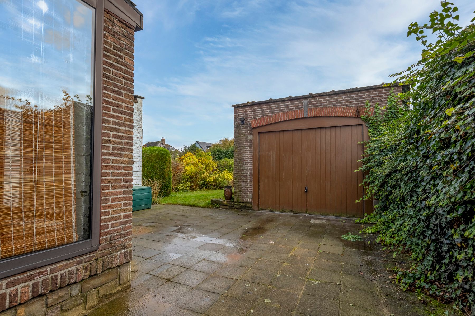 Halfopen woning met 4 slaapkamers, tuin en garage foto 22