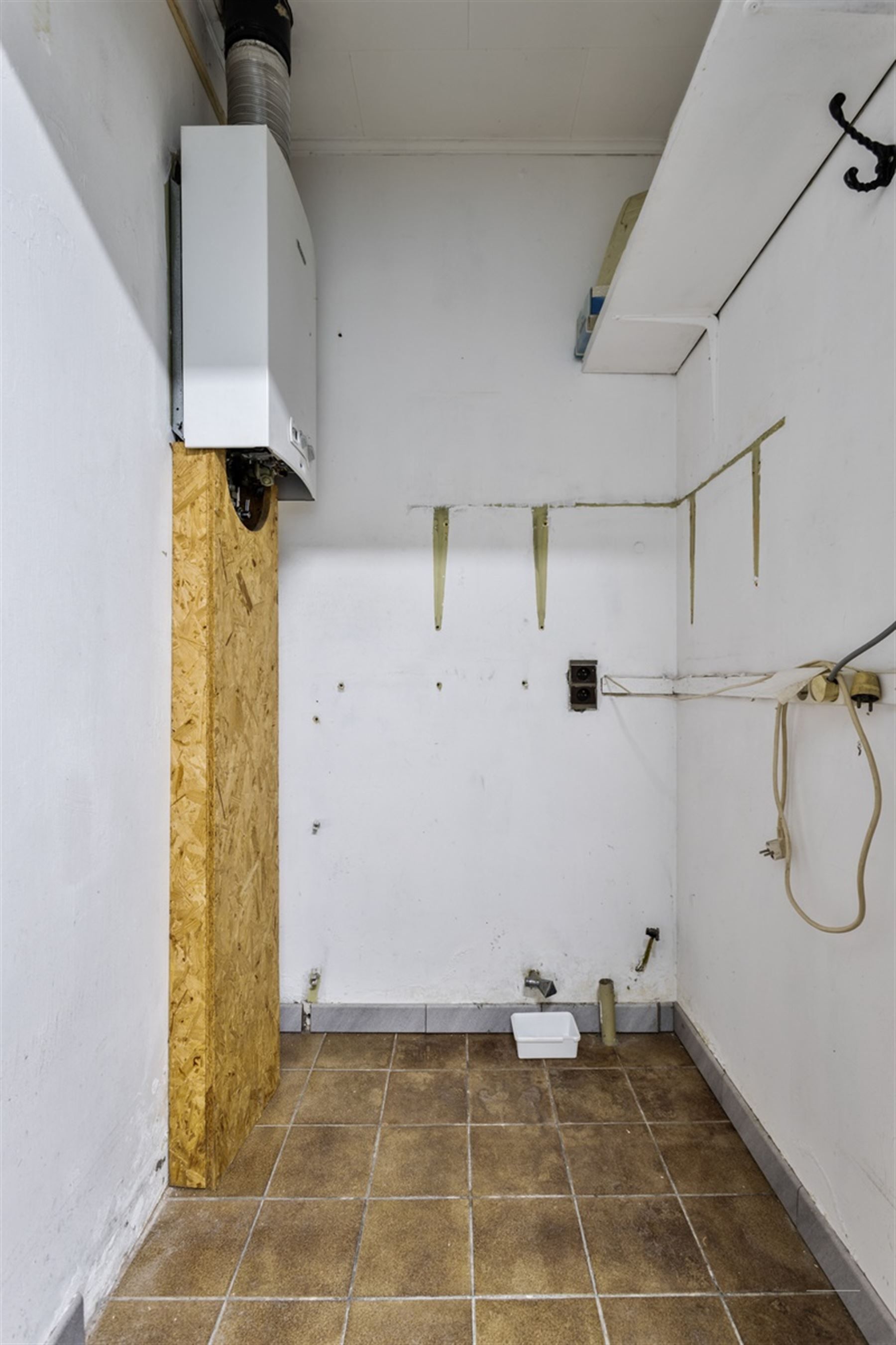 Starterswoning of ideale investeringseigendom met garage foto 16