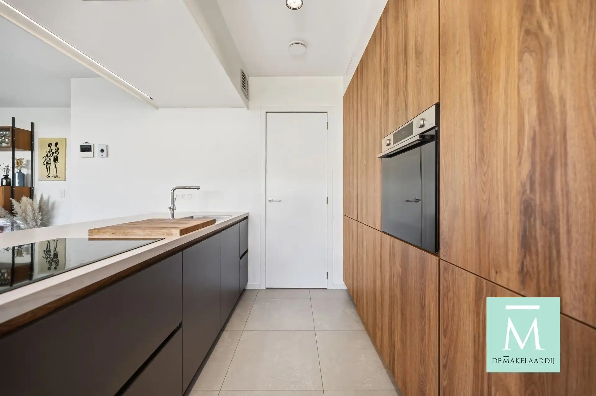 Instapklaar gelijkvloers appartement (2023) met zonnige tuin en laadpaal! foto 4