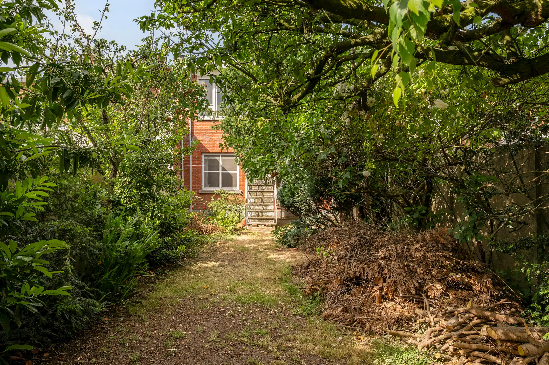 Te renoveren woning met garage én tuin foto 19