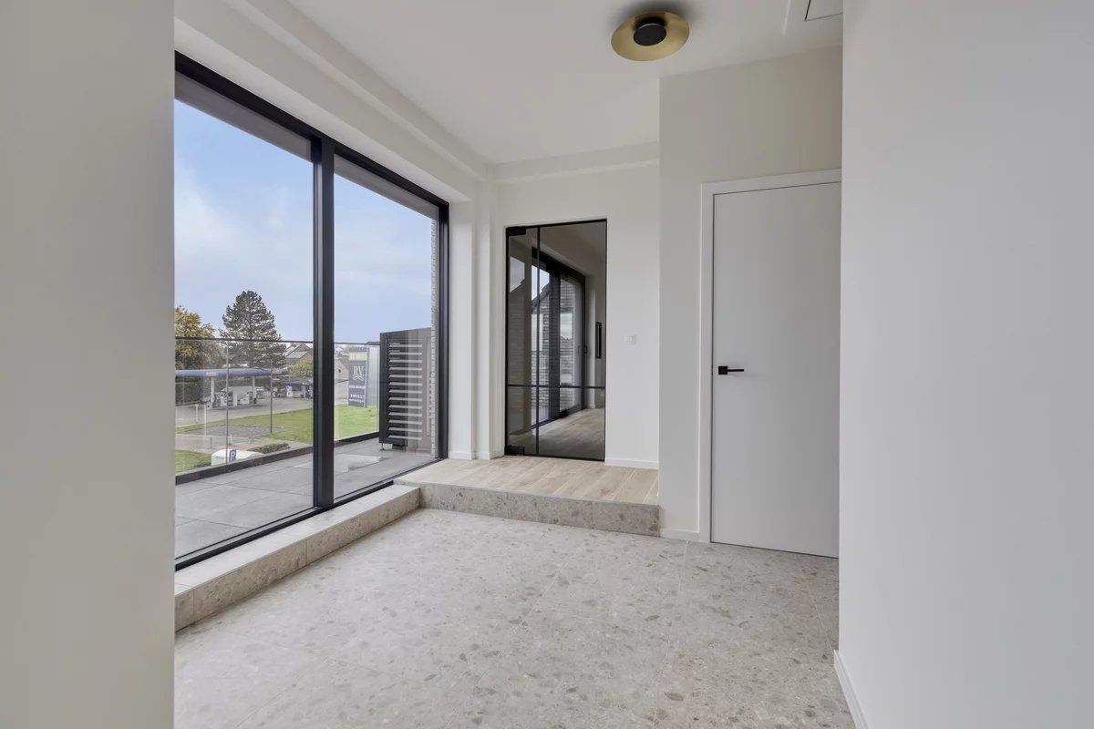 EXCLUSIEF EN KWALITATIEF NIEUWBOUWAPPARTEMENT VAN 163 M² MET 3 SLPK'S, 2 BADK'S EN RIANTE TERRASSEN IN MUNSTERBILZEN foto 4