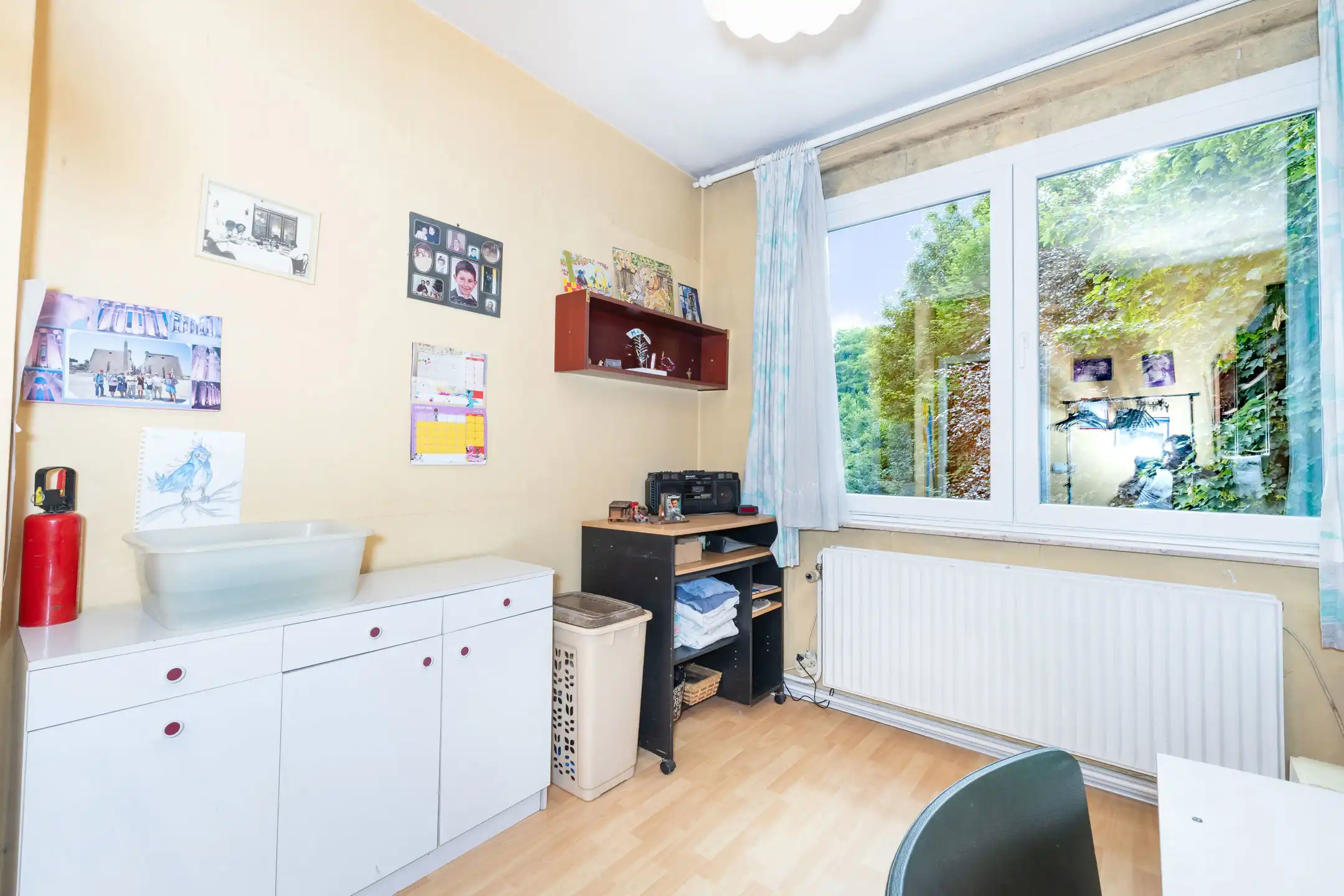 Rustig gelegen huis met drie gevels, tuin en garage foto 20