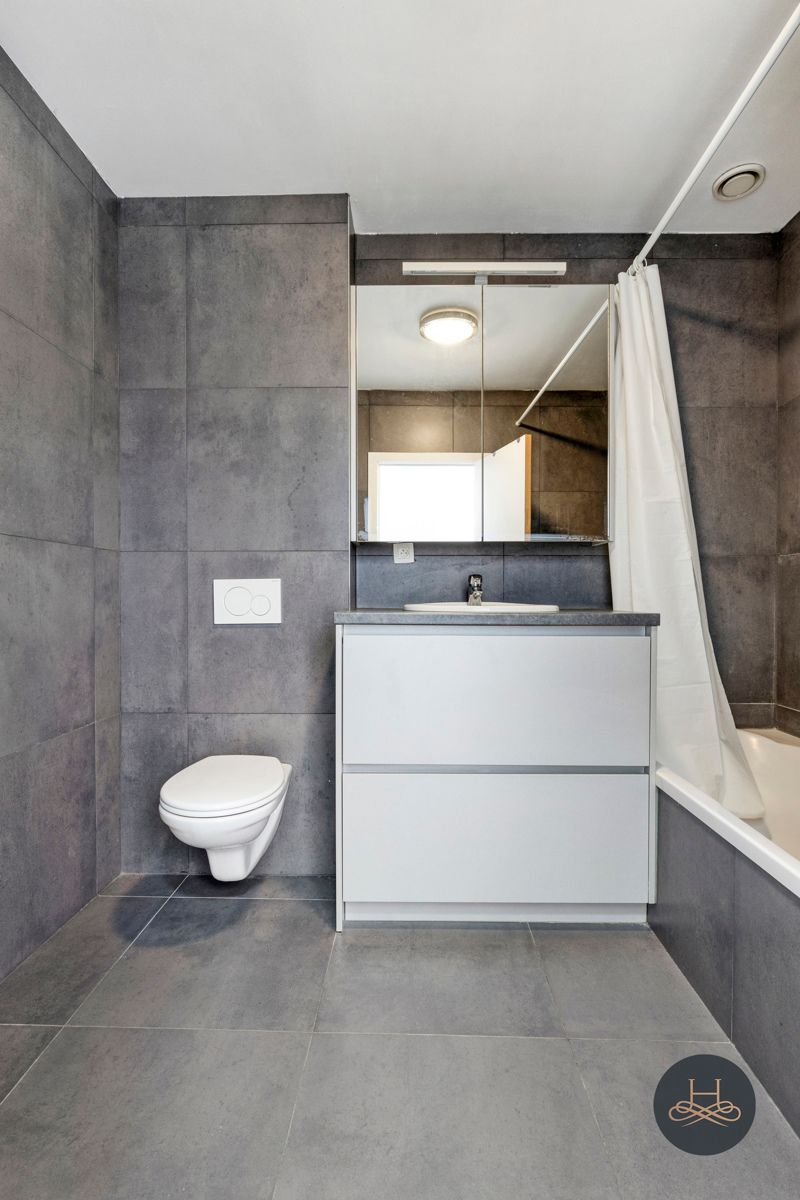 Ruime vernieuwde woning in hartje Mechelen foto 17