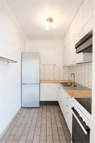 Centraal gelegen gelijkvloers 2-slaapkamerappartement — ideaal als starter of opbrengsteigendom foto 7