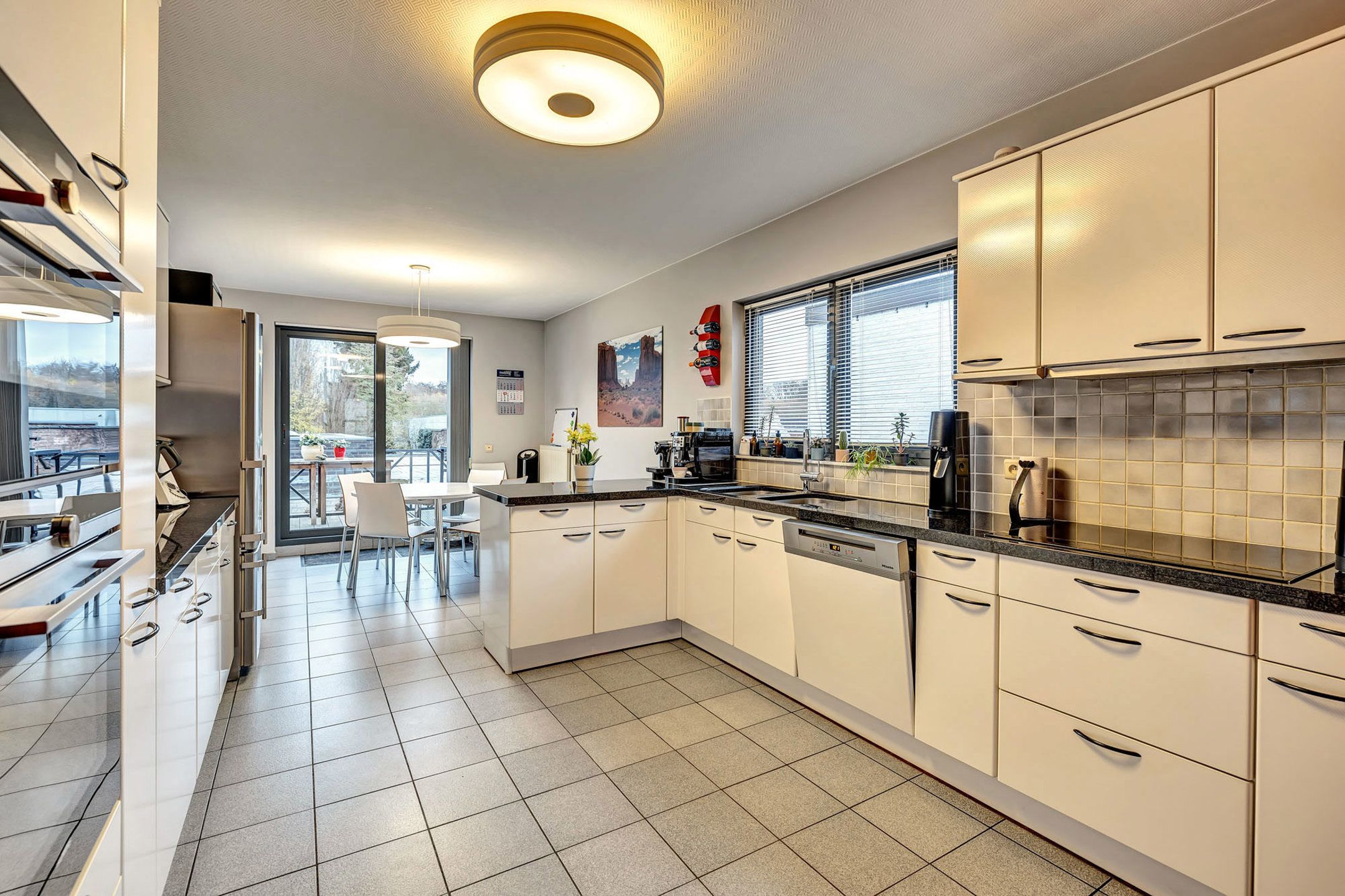 Unieke combinatie van wooncomfort, atelier en polyvalente tuin foto 9