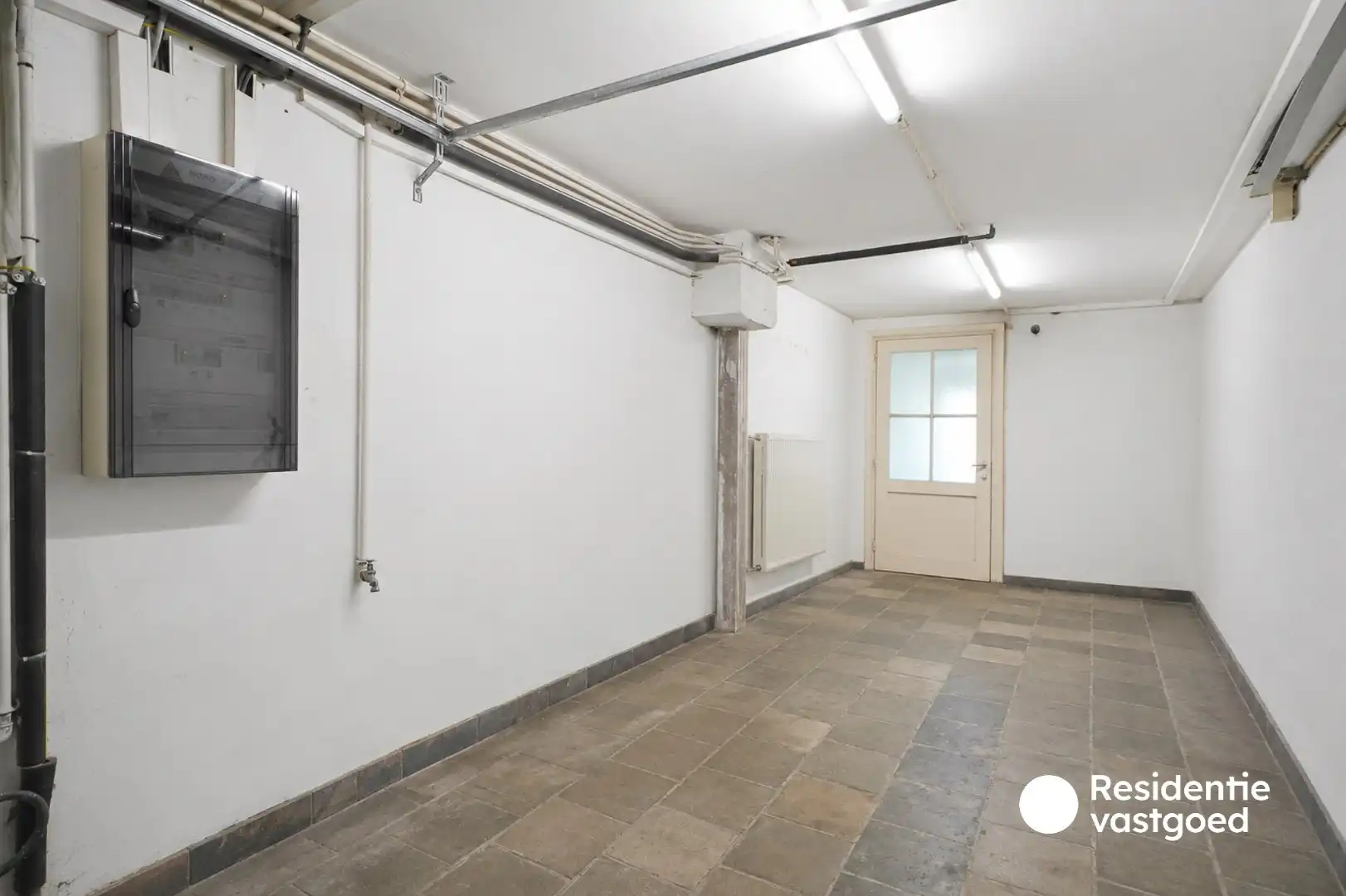 Interessante investeringseigendom met 2 vergunde appartementen, garage en ruime tuin! foto 11