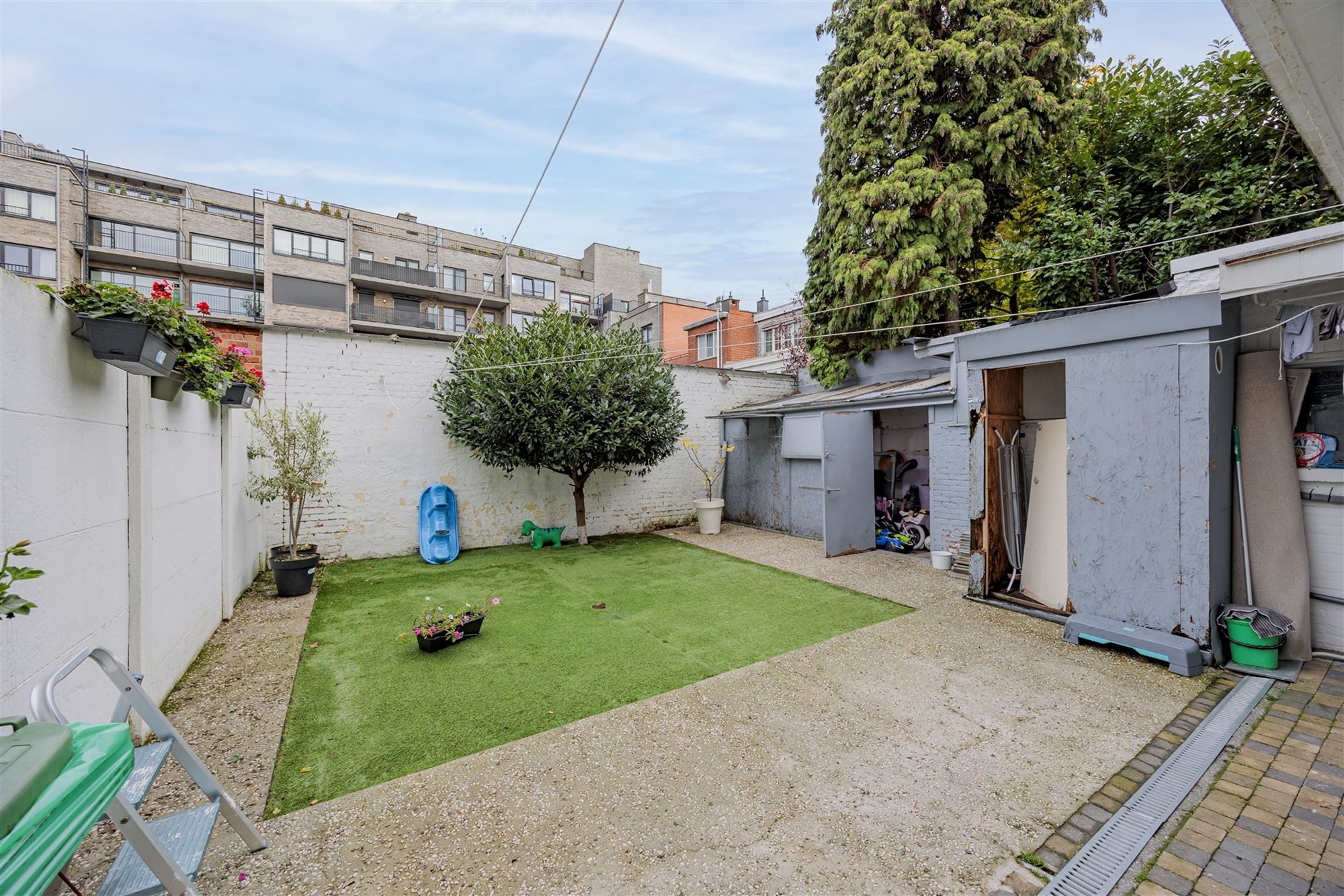 Vergund betonnen opbrengsteigendom met 3 appartementen + garagebox foto 12