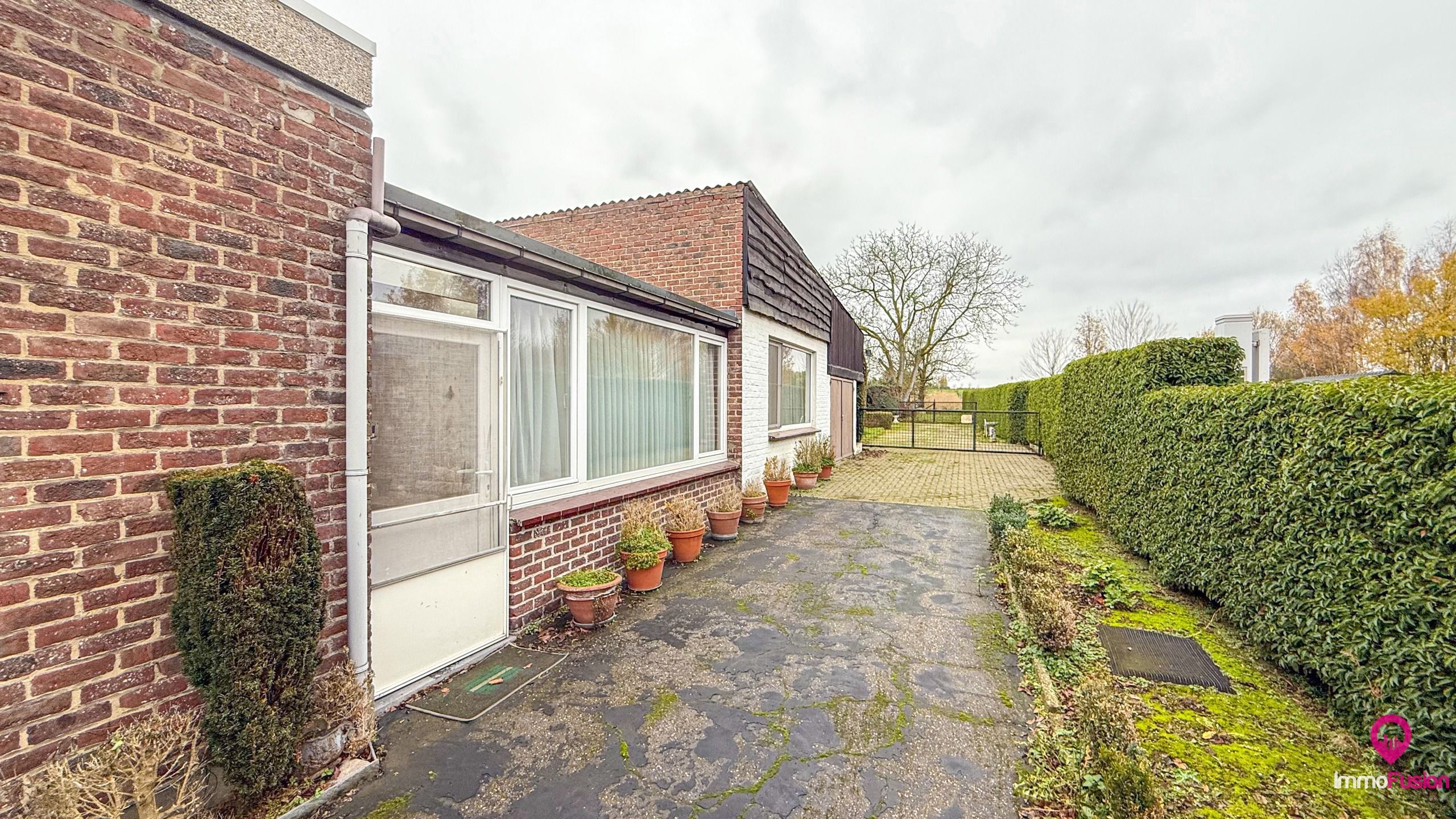 Bungalow met grote werkplaats en weide op 42 are in Alken foto 29