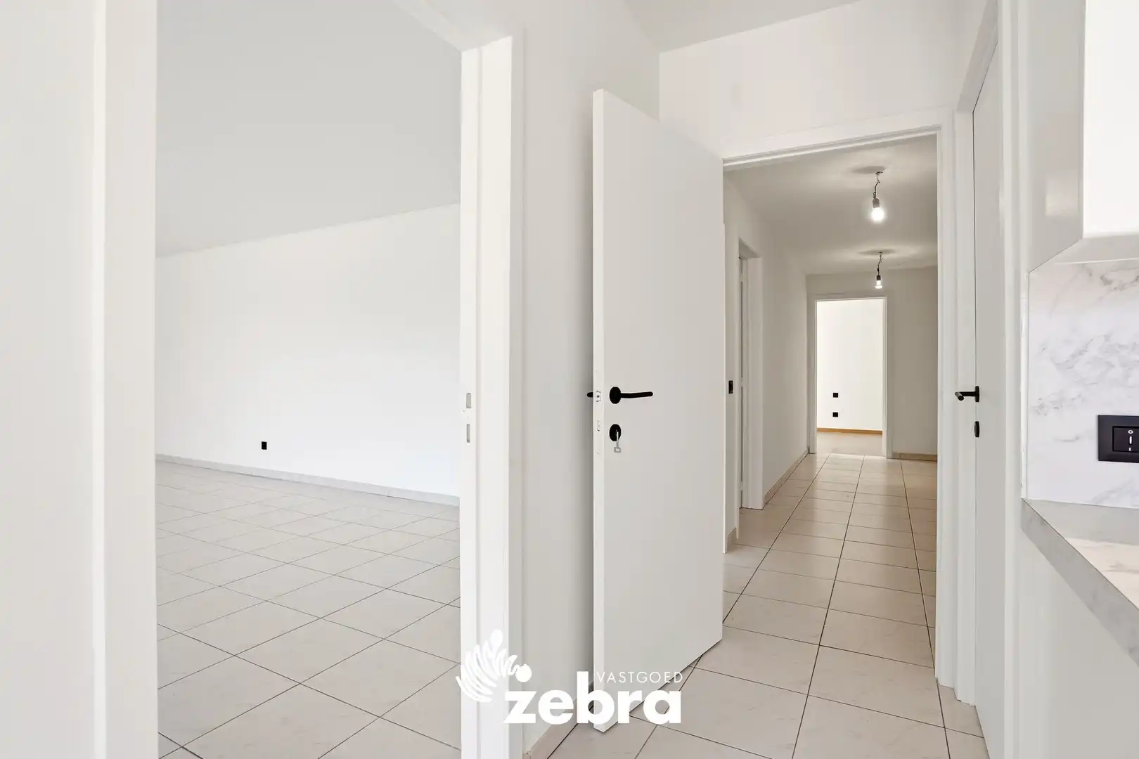 Zeer ruim appartement (137 m²) te koop met dubbele garage in het hartje van Tielt! foto 14