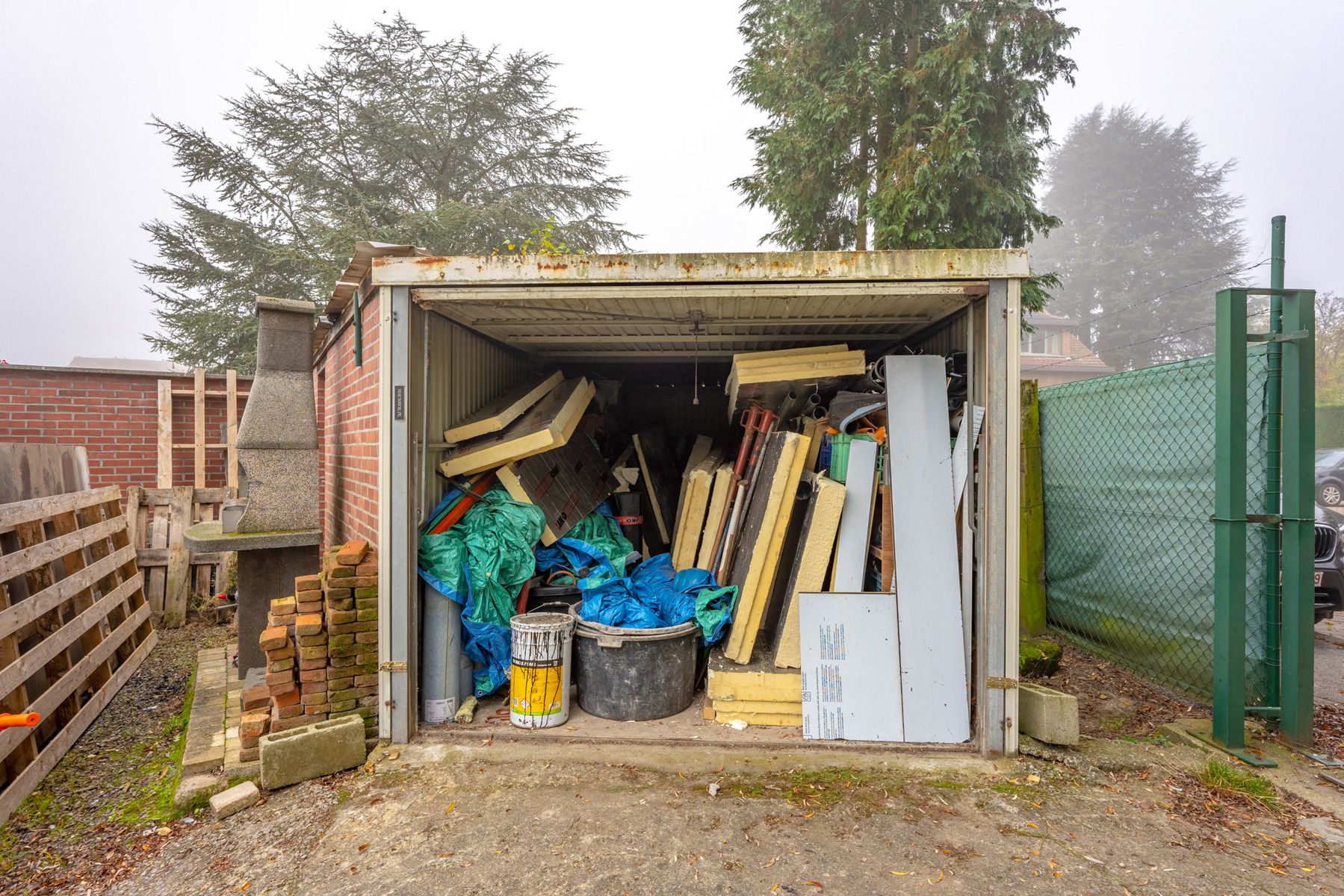 Lot van 1 magazijn, 3 garageboxen, 1 berging en 5 parkings foto 5