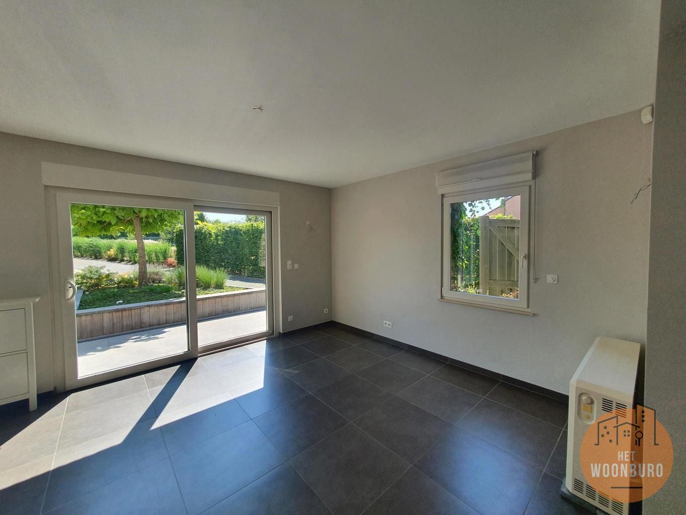 Prachtig gelijkvloersappartement met 3 slpks, garage en tuin foto 9