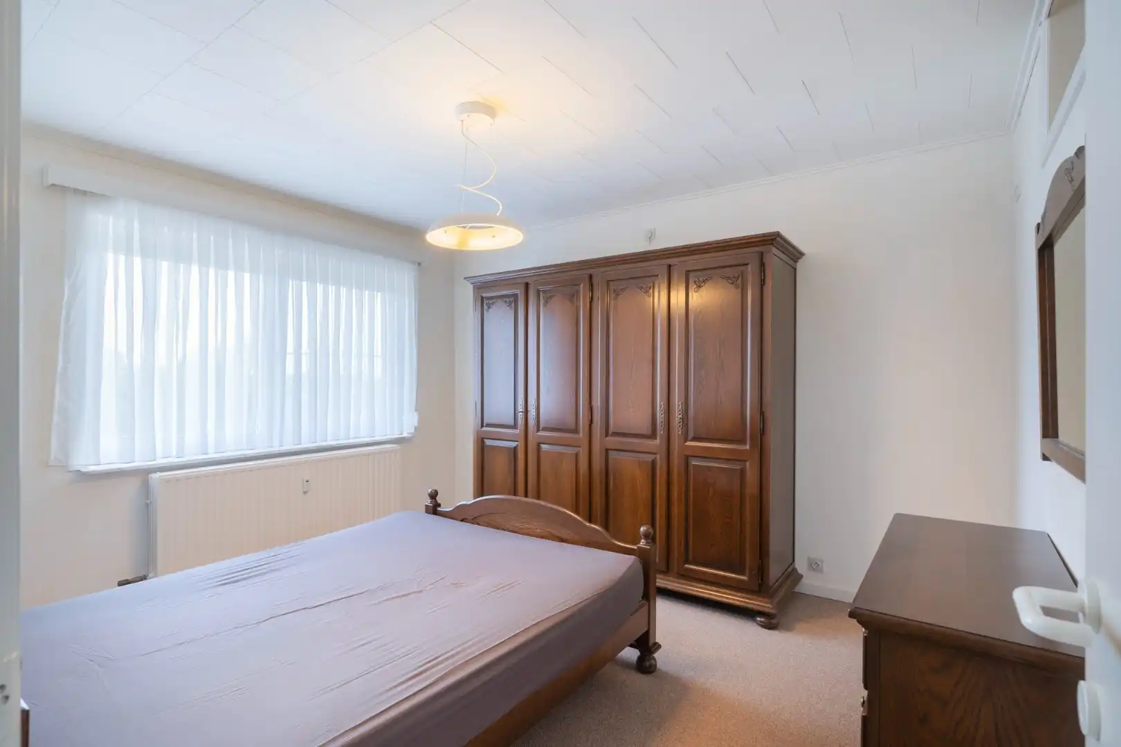 Ruim appartement op de 3° verdieping in hartje Hoeselt, met 3 slaapkamers, garage en prachtig terras met panoramisch uitzicht.  foto 23