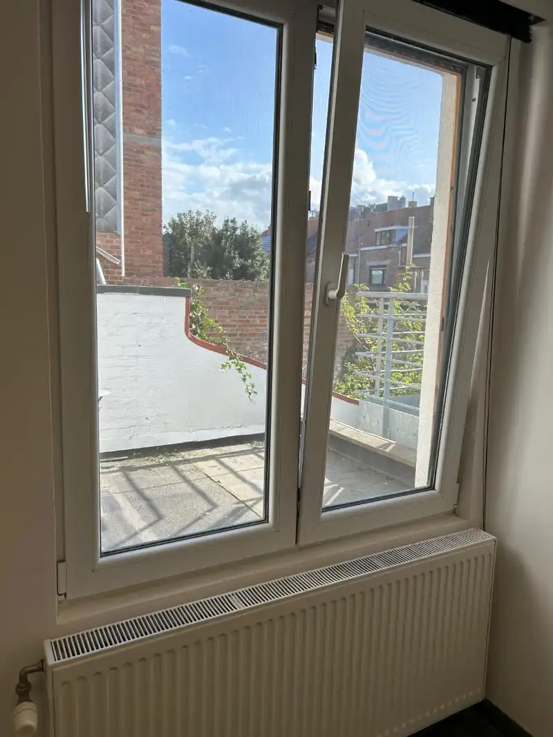 Volledig gerenoveerd  1-slaapkamerappartment foto 24