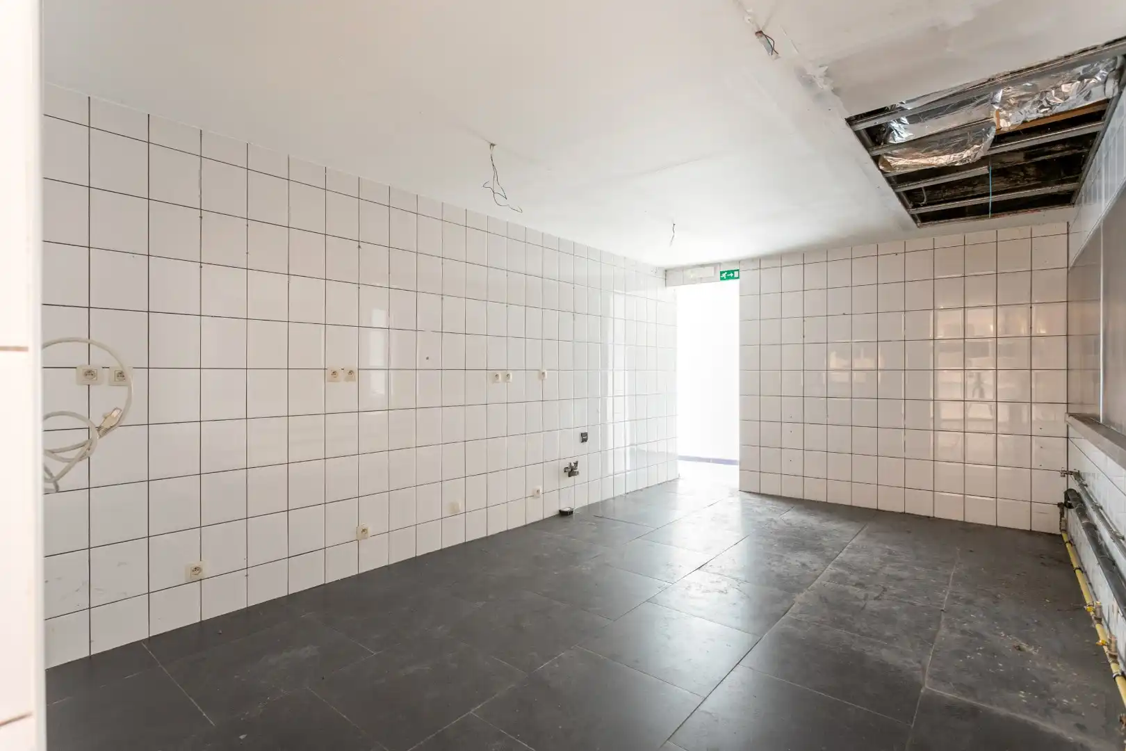 Handelsruimte met woonst op een gunstige ligging foto 6