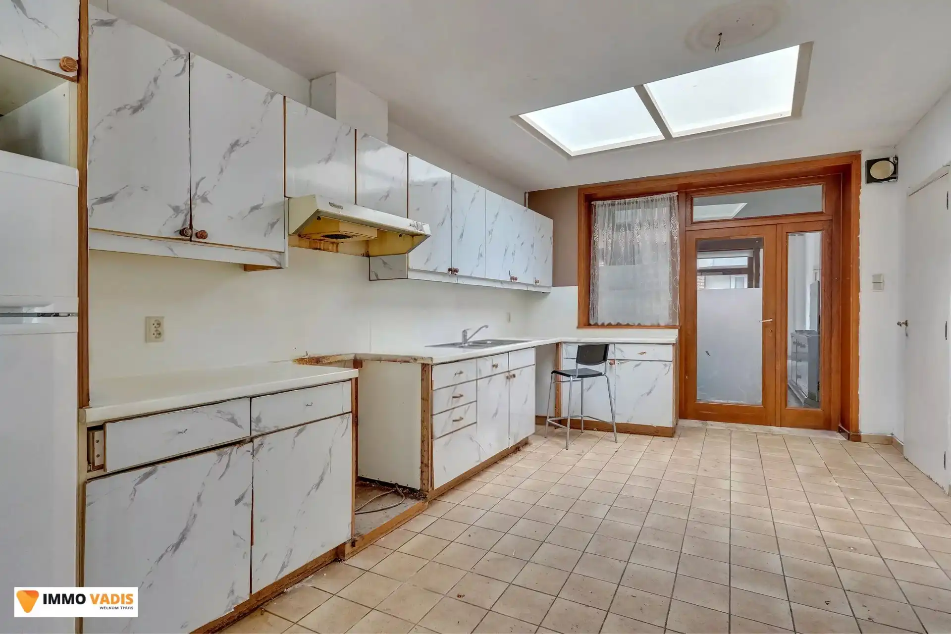 Authentiek herenhuis met karakter, klaar voor een stijlvolle renovatie. foto 5