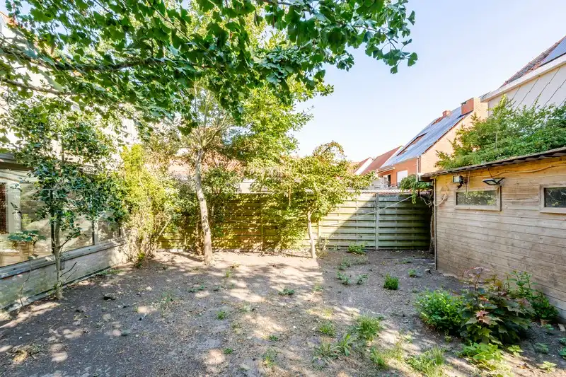 Op te frissen woning met perceel bouwgrond foto 24