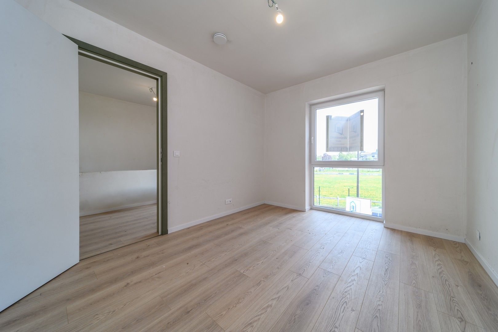 Gesloten nieuwbouwwoning met tuin te Mere foto 8