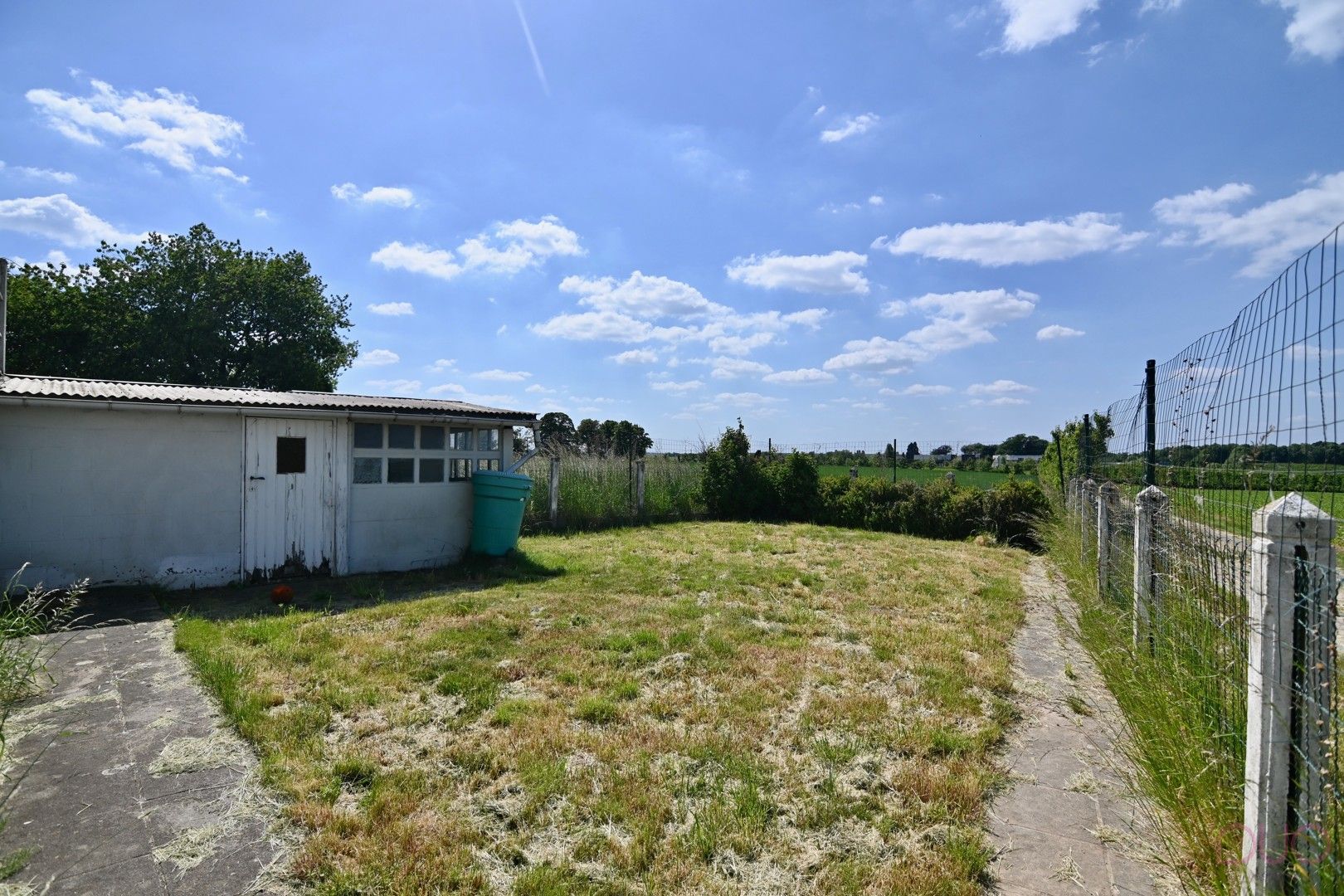 Knappe vrijstaande woning nabij het stadscentrum van Sint-Truiden met idyllische uitzicht en grote garage foto 2