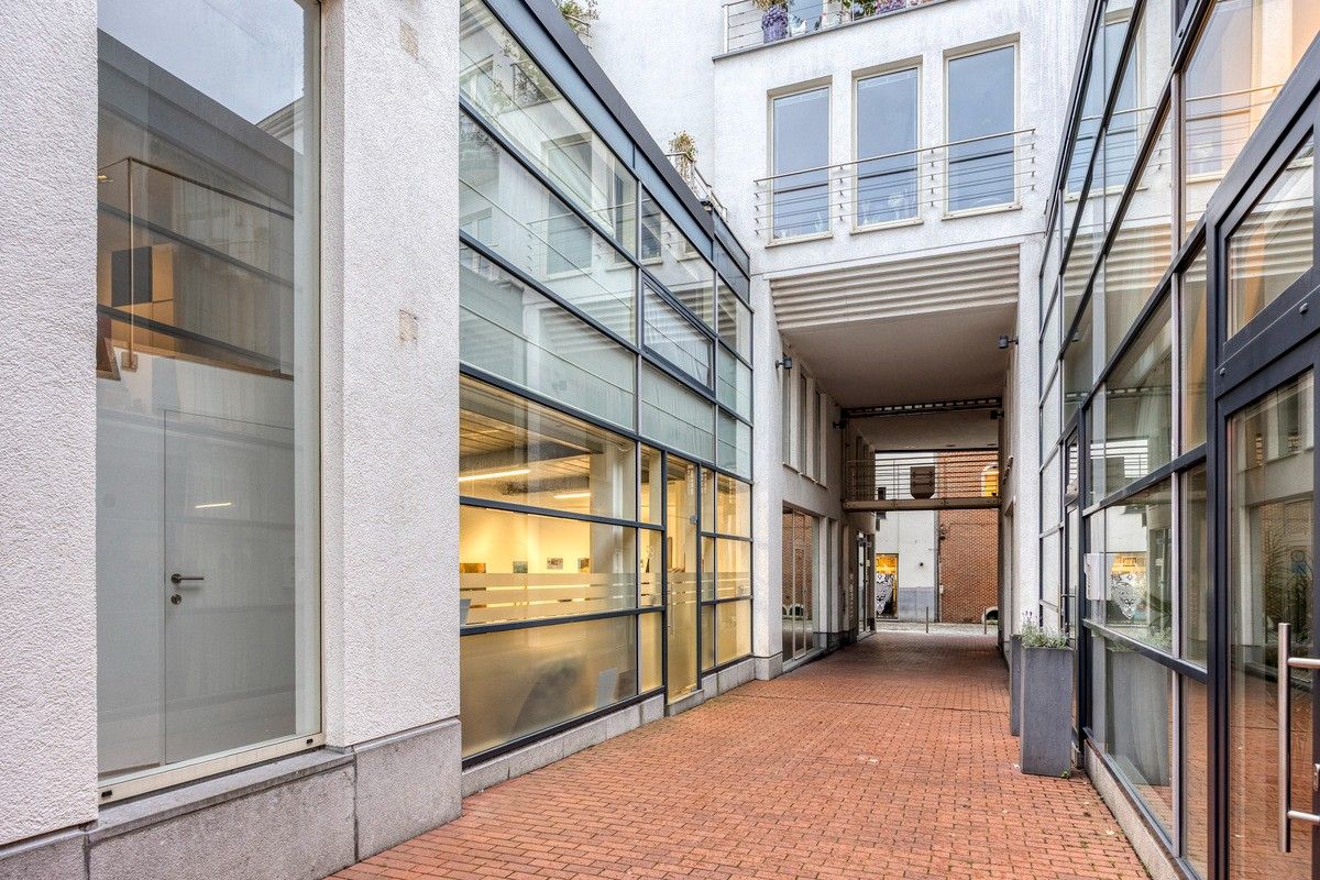 Exclusief stadsappartement met karakter en groot terras aan het Belfort. foto 31