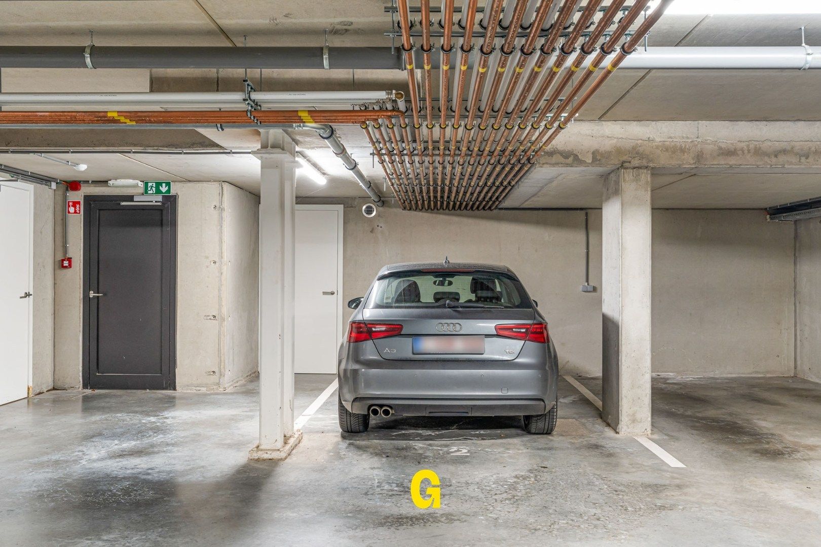 Recent gelijkvloersappartement met 2 slaapkamers, terras, voor- en achtertuin, standplaats en extra ruime berging in hartje Hoeselt foto 21