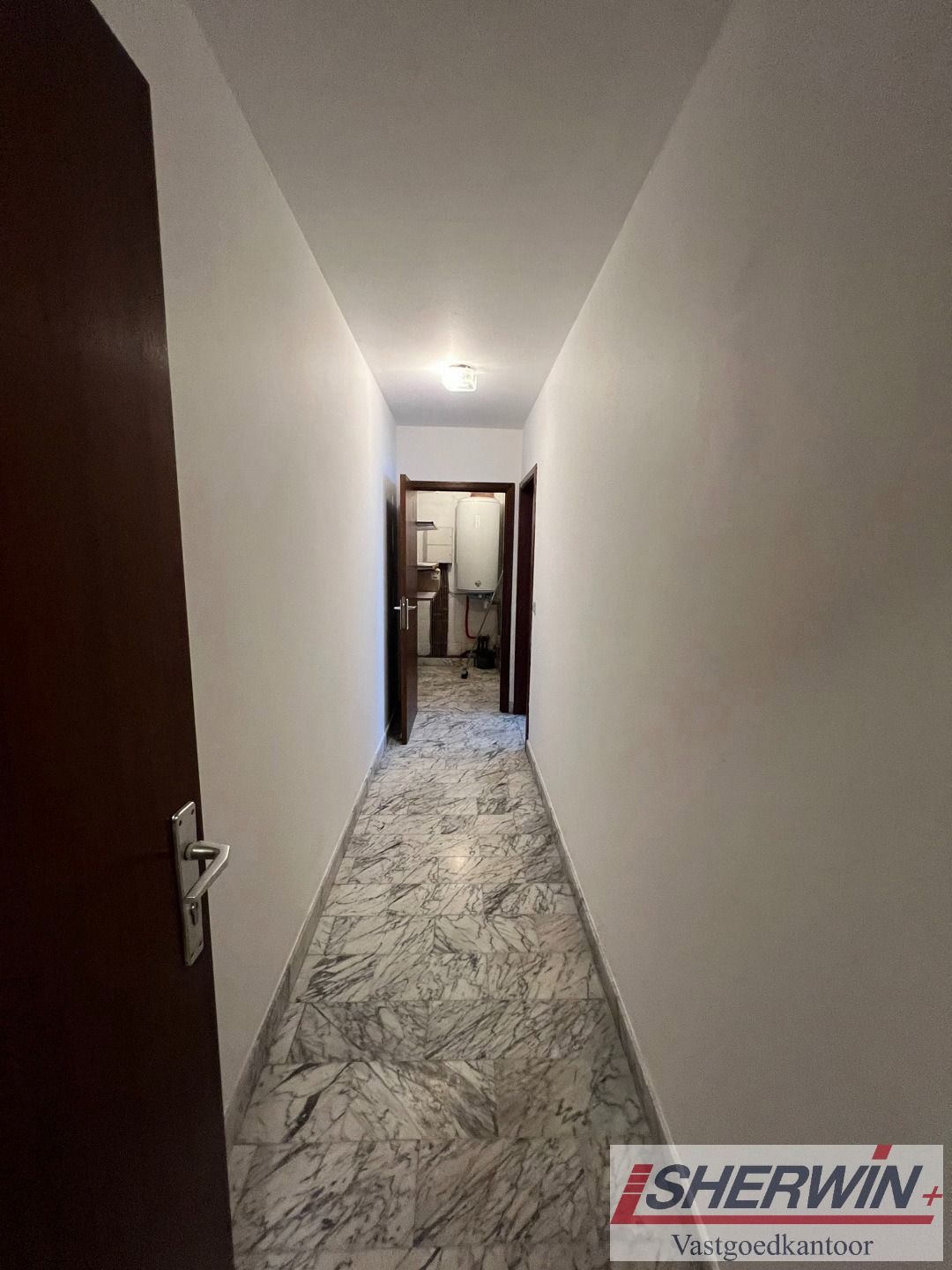 Deel van zeer goed gelegen appartementsgebouw in centrum foto 26