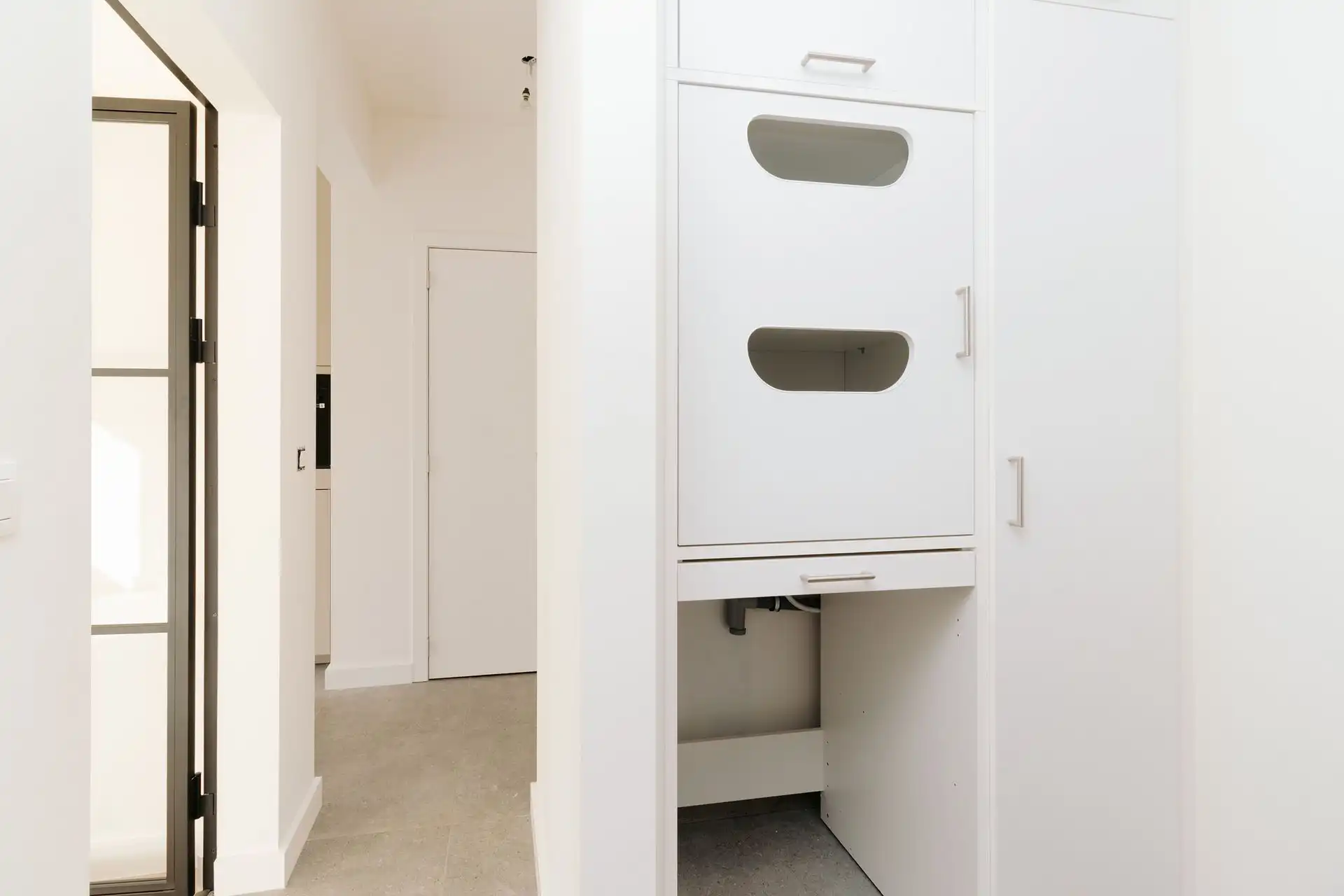 Gerenoveerd gelijkvloers appartement met tuin foto 12