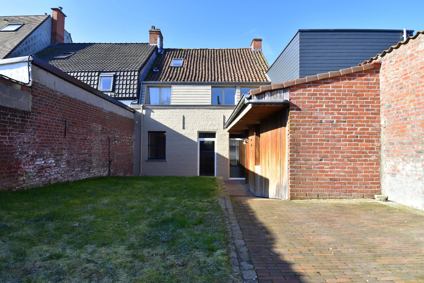 Energiezuinige (label B!) gezinswoning met praktijkruimte, 3 slaapkamers en tuin te koop in hartje Bellegem foto 12