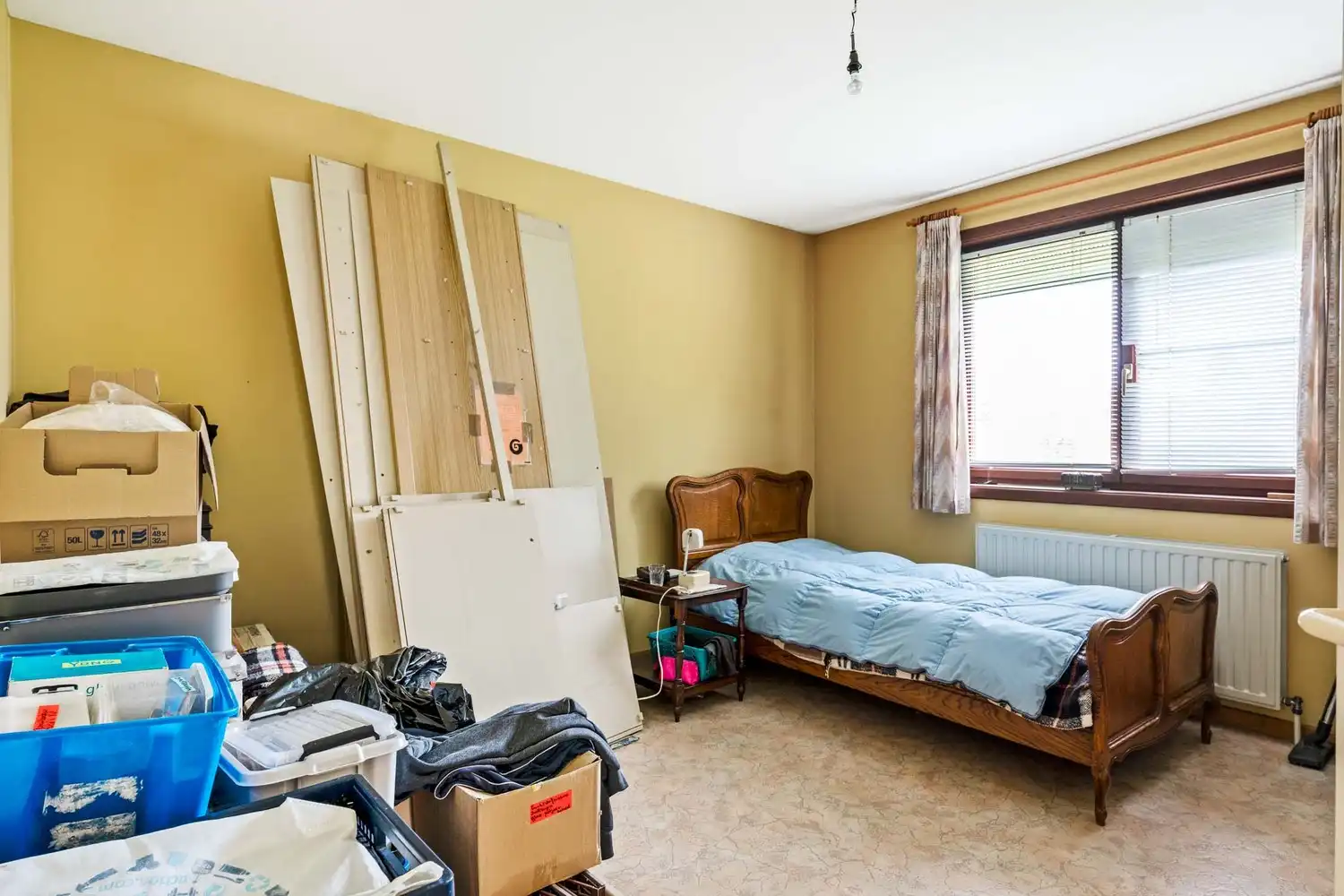 Vrijstaande laagbouwwoning met zonnige tuin en uitbreidingsmogelijkheden in Oelegem! foto 8