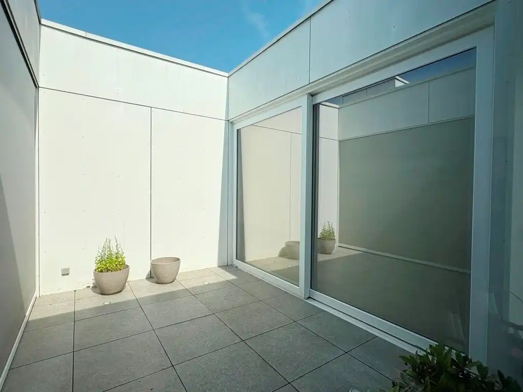 Bijzonder stijlvolle assistentie-penthouse met groot terras, midden in het groen, hartje Gent. foto 10