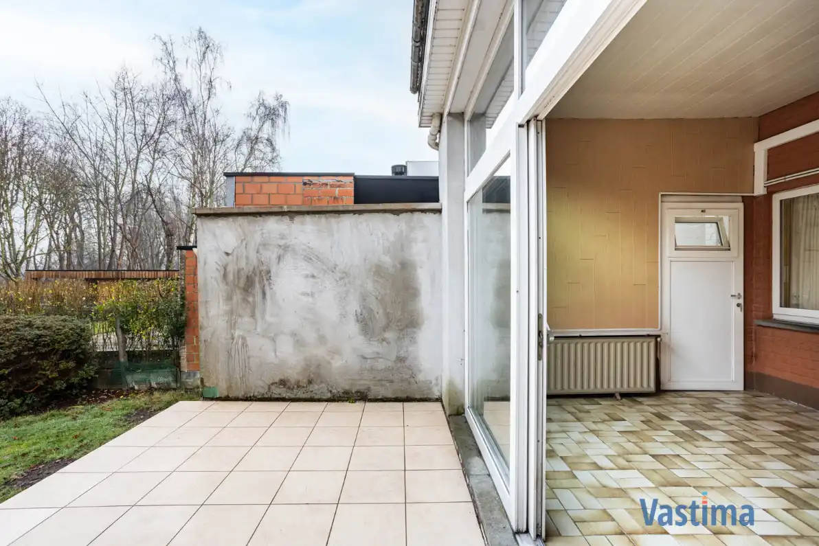 Op te frissen gezinswoning met 3 slaapkamers, garage en tuin foto 10