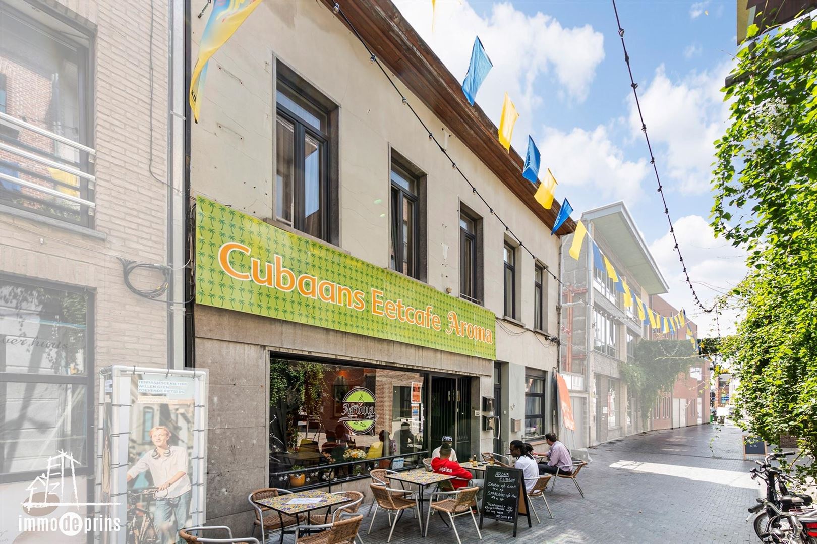 Opbrengsteigendom winkel met woonst  foto 2