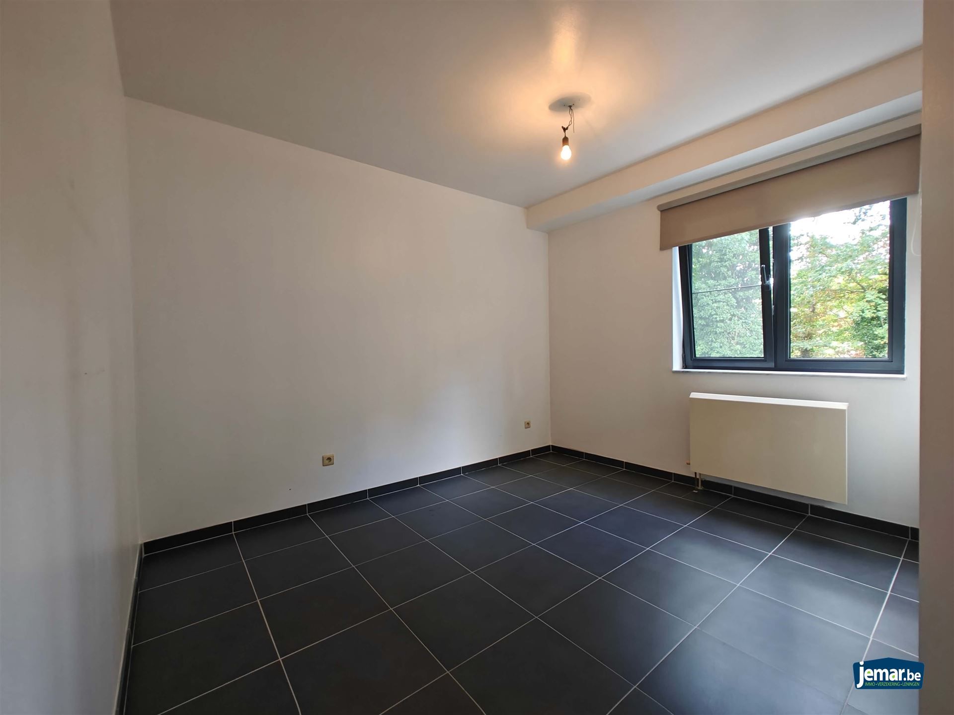 Instapklaar gerenoveerd appartement met 2 slaapkamers, ondergrondsparking en  berging  foto 11