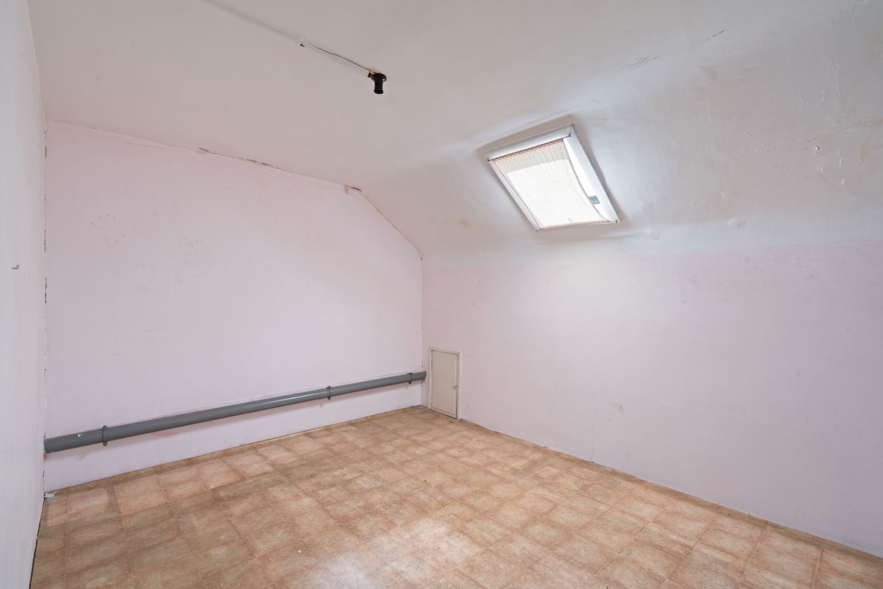 Te renoveren woning met tuin in Gentbrugge foto 13