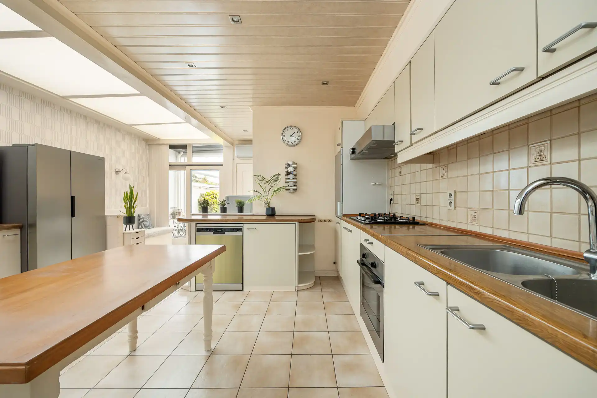 Perfect onderhouden woning: 3 slaapkamers, garage & ZW-tuin. foto 7