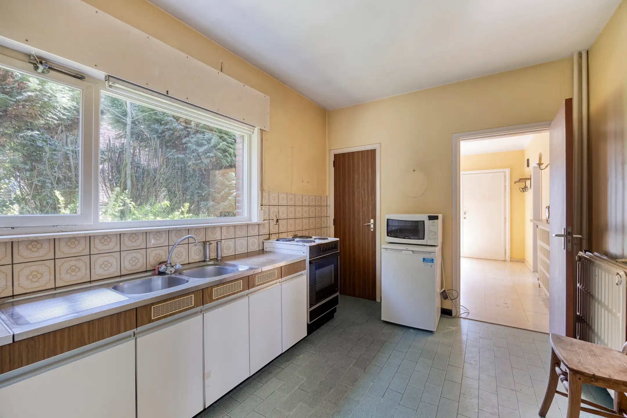 Op te frissen woning met 3 slaapkamers op een goede locatie foto 6