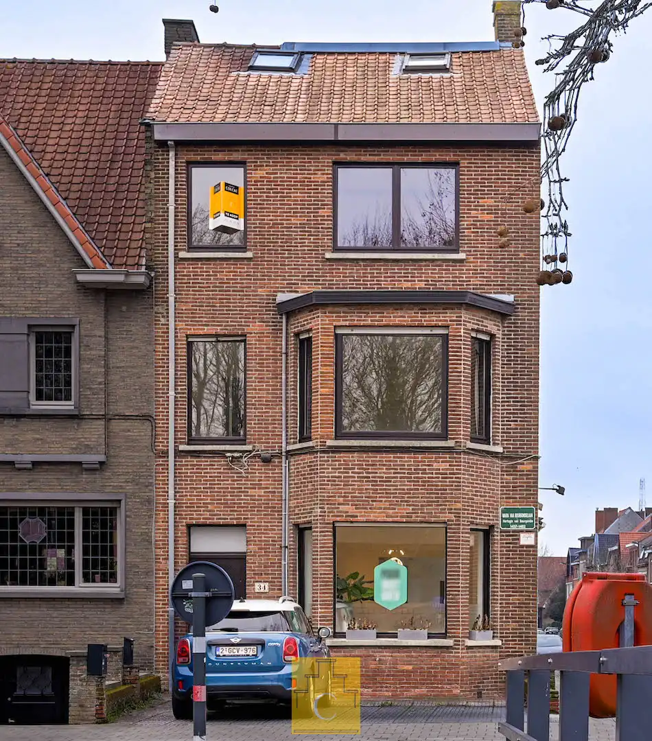 karaktervol handelspand met woonst en parking voor 2 wagens op toplocatie in Brugge (Kristus Koning) foto 18