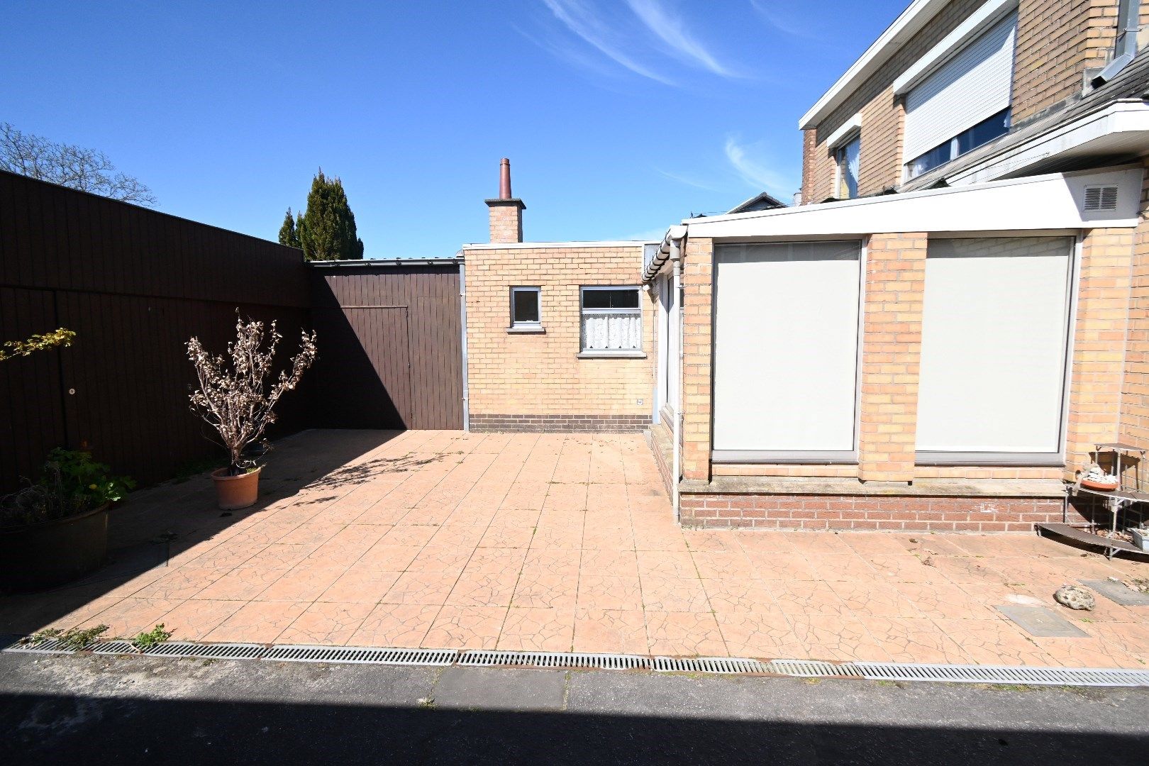 Halfopen bebouwing met garage en tuin foto 20